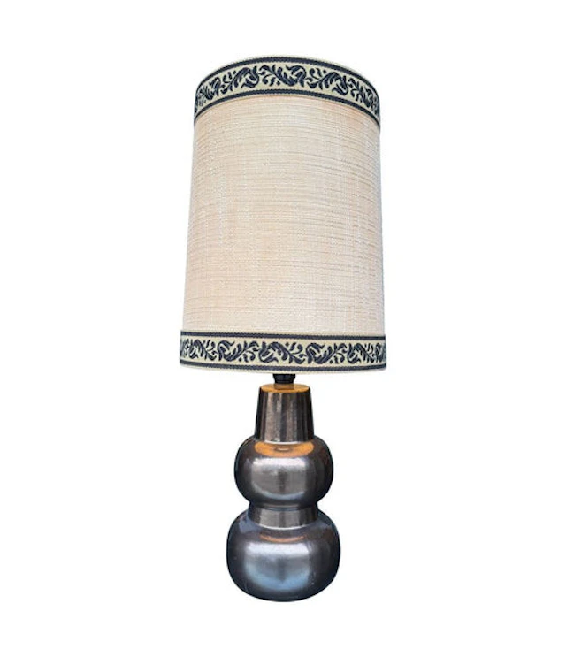 A 1960s French ceramic lamp with orignal hessian shade
