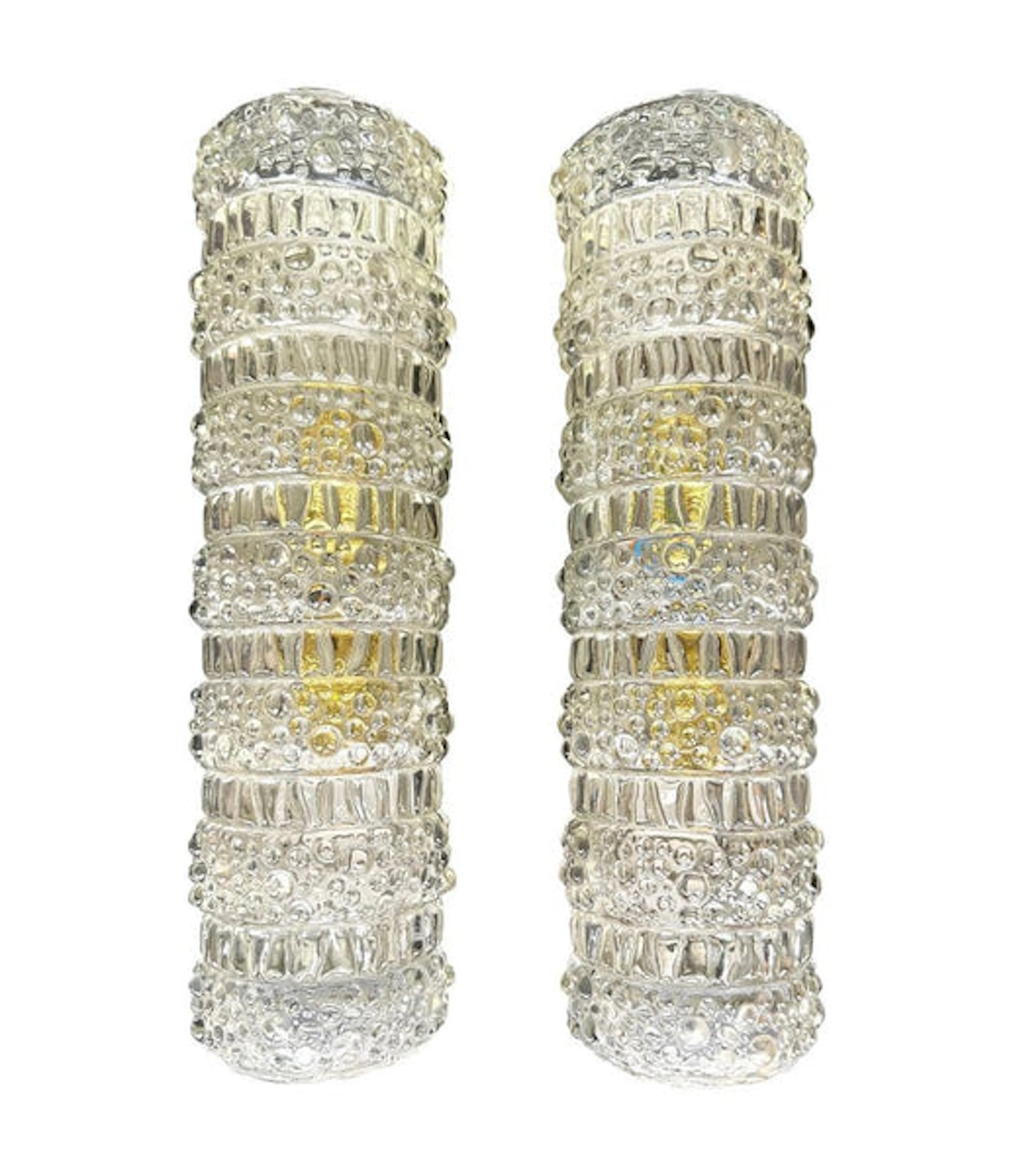 A pair of 1960s clear geometric textured glass wall lights
