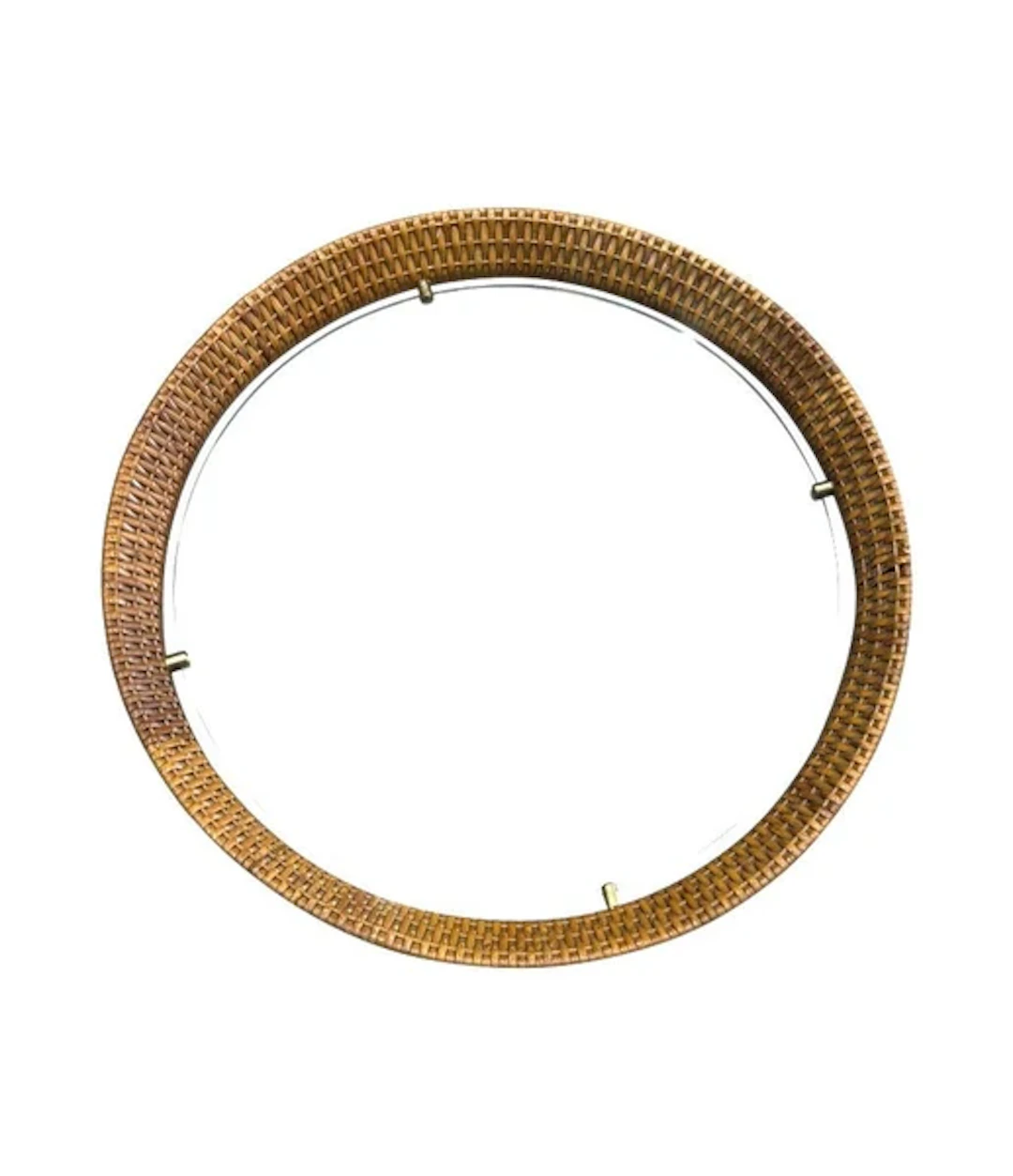 A circular 1950s Italian woven rattan mirror by Cantu, Roma with brass detail