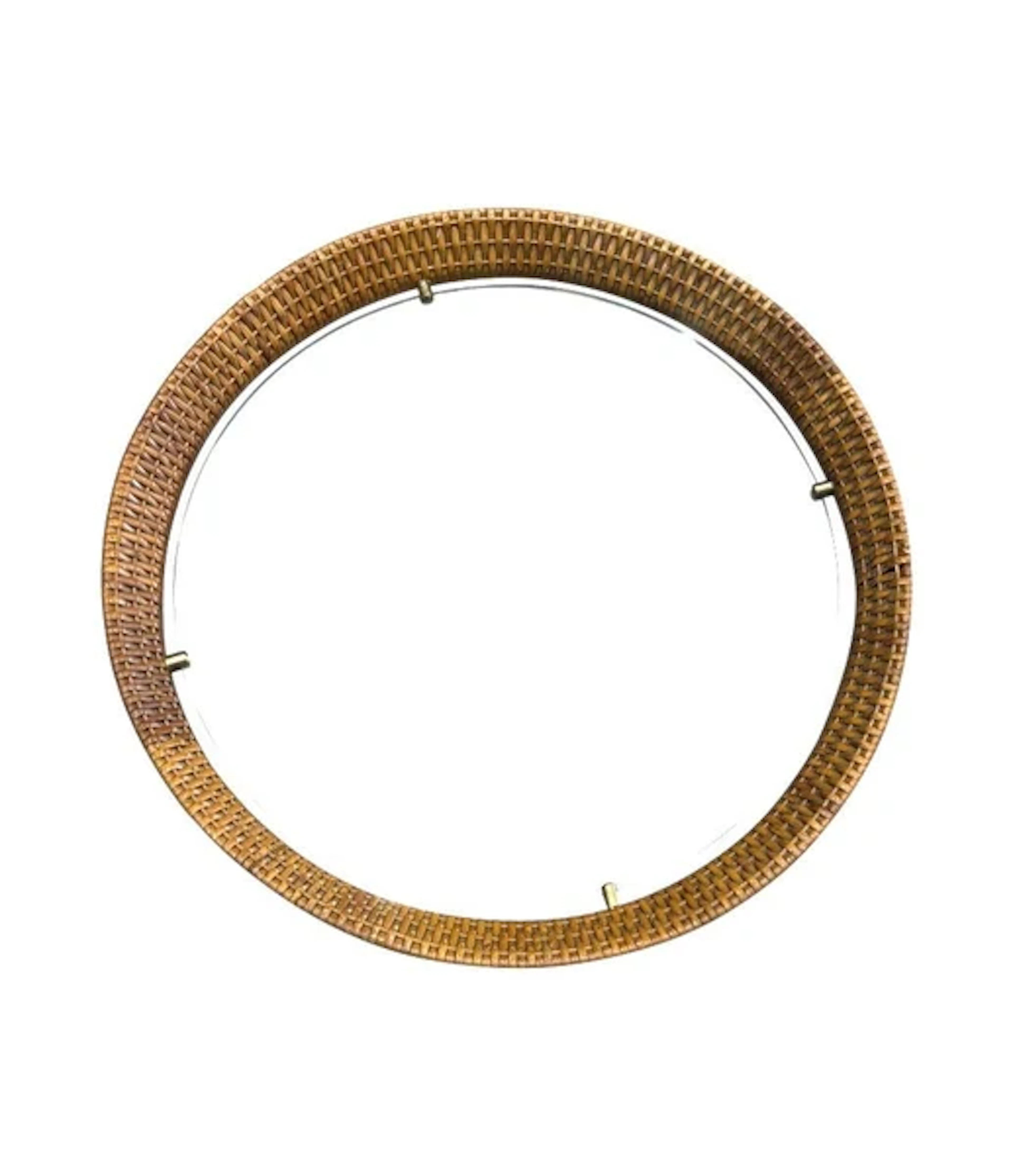A circular 1950s Italian woven rattan mirror by Cantu, Roma with brass detail