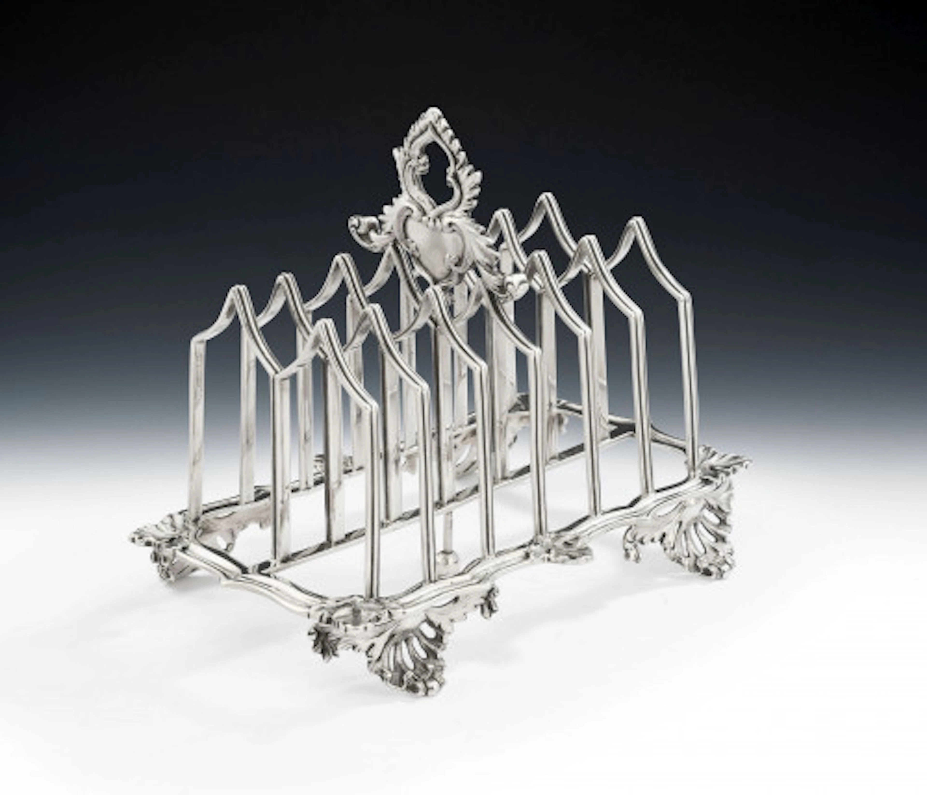 An unusual William IV Toast Rack made in London in 1836 by Charles Fox II