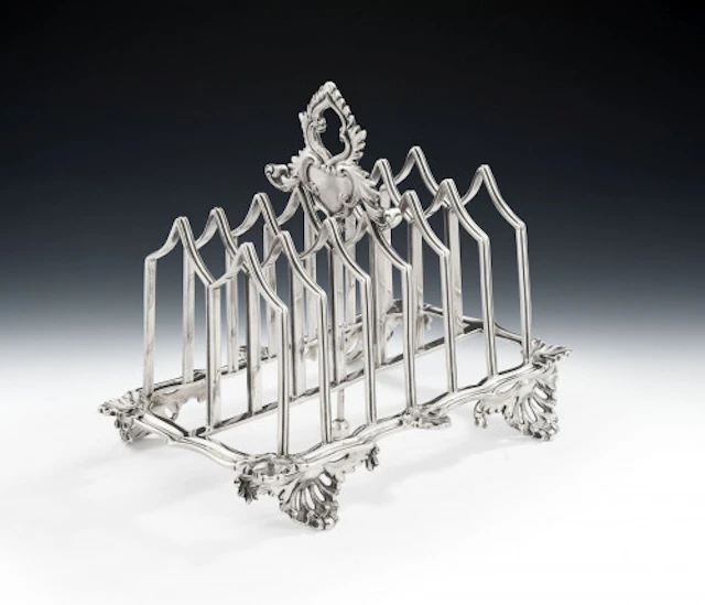 An unusual William IV Toast Rack made in London in 1836 by Charles Fox II