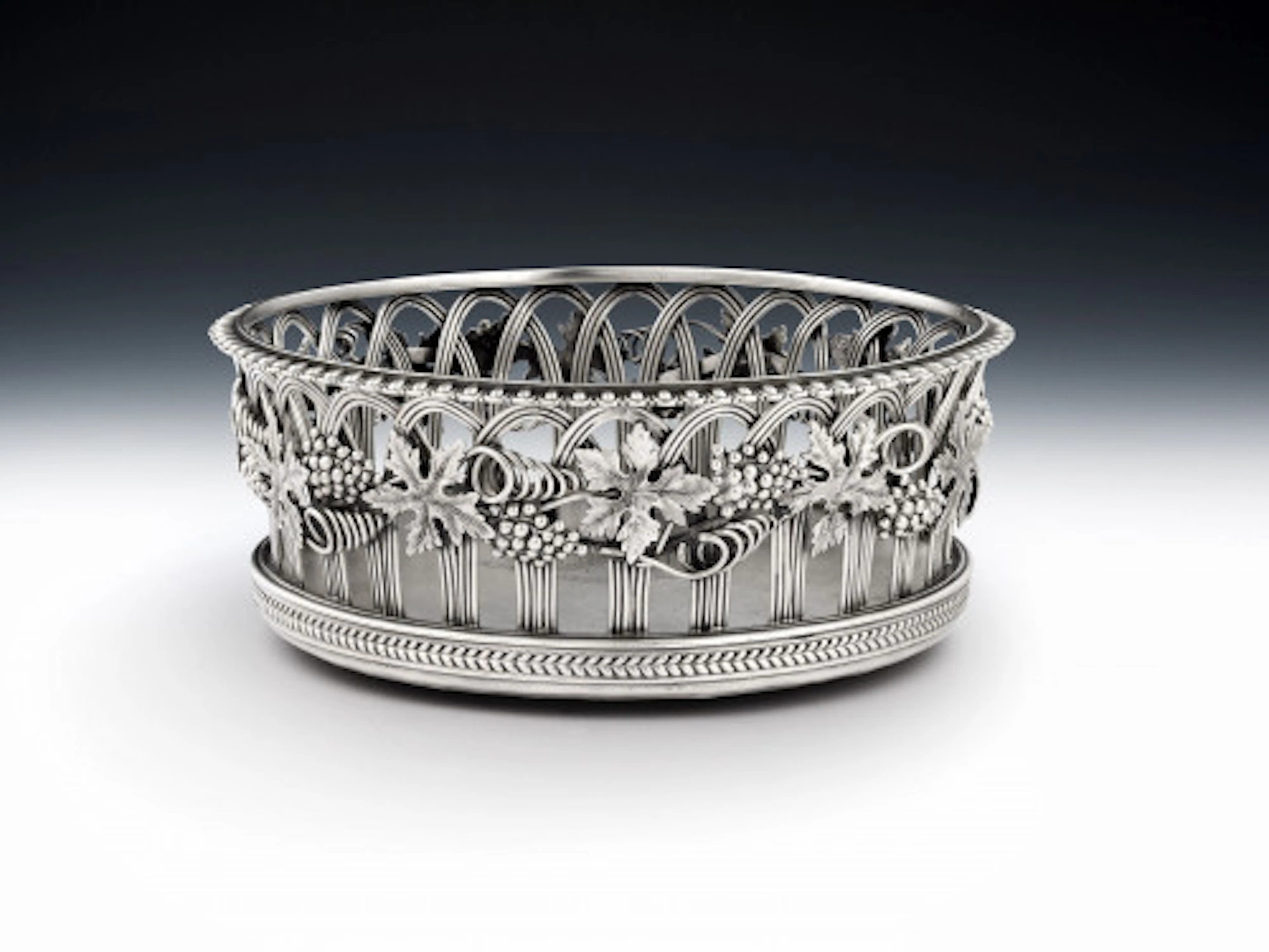An extremely fine, and unusual, George III Silver based Wine Coaster