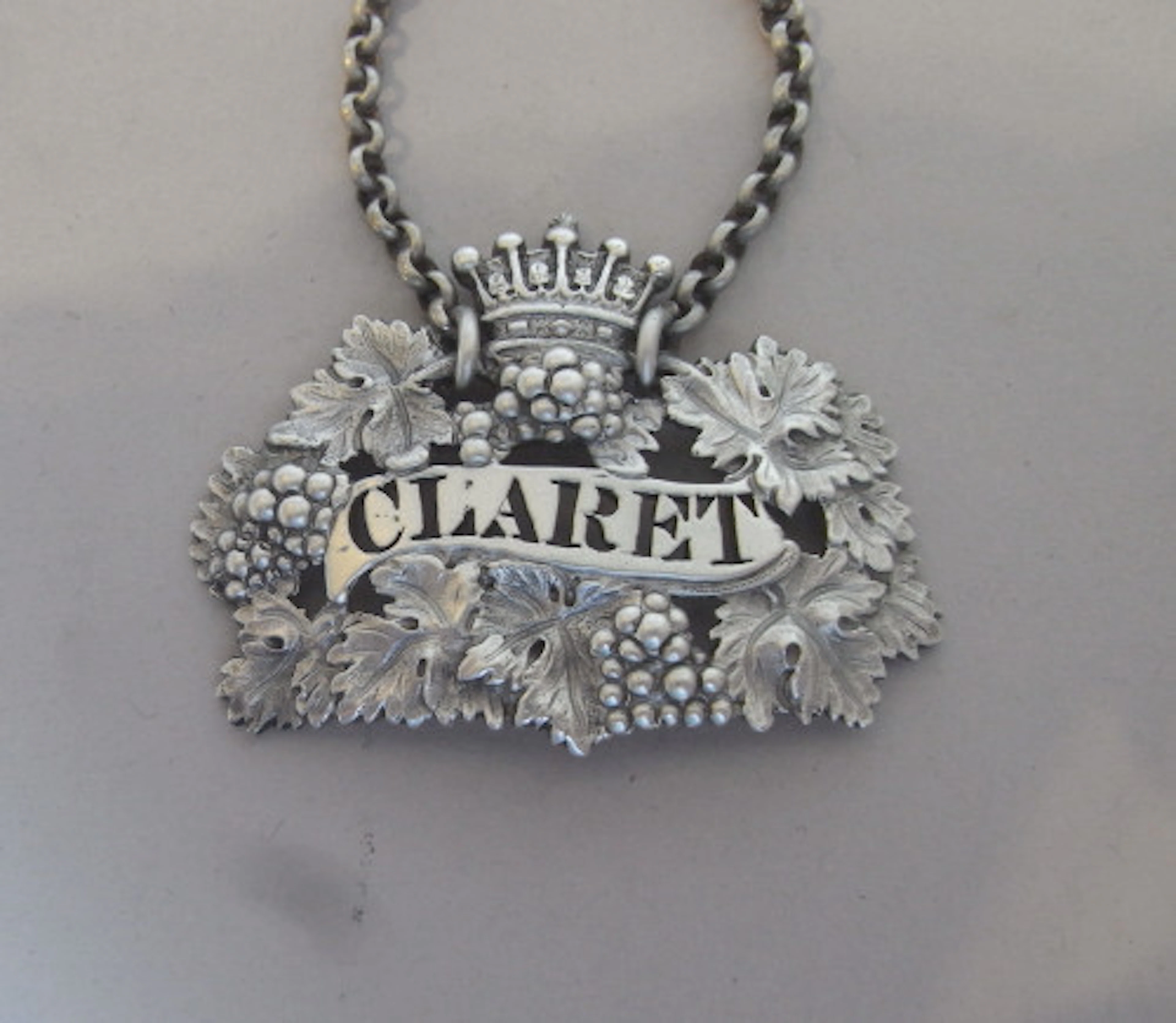 A rare cast wine label made most probably for the 13th Earl of Eglinton