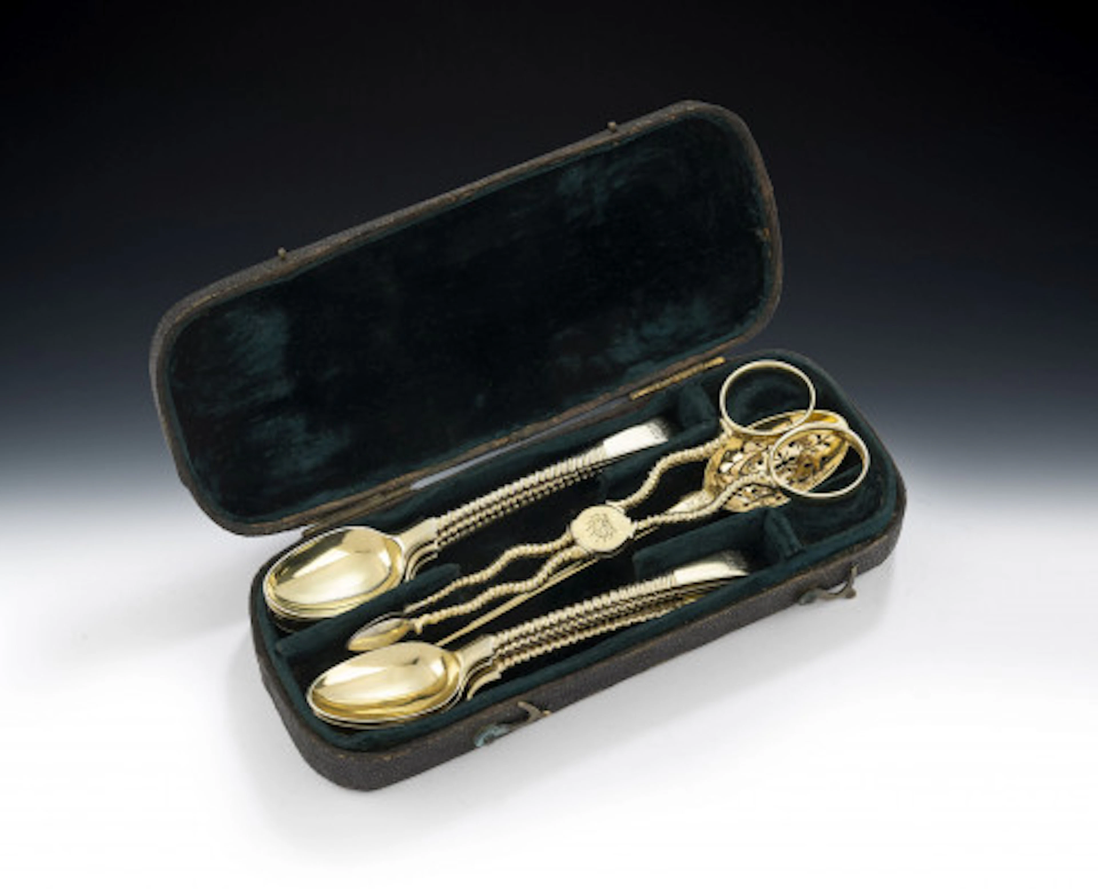 A very rare set of George II silver gilt Teaspoons together with their