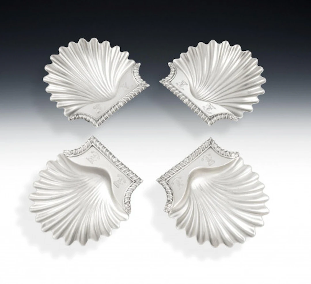 A very fine set of four George III Butter Shells made in London in