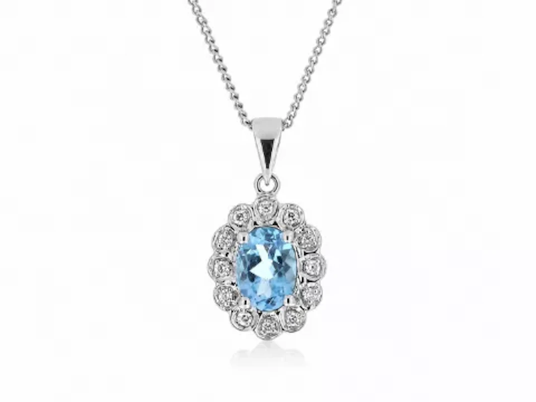 9ct White Gold Fancy Cluster Diamond Blue Topaz Pendant (BT0.86) 0.02 Carats