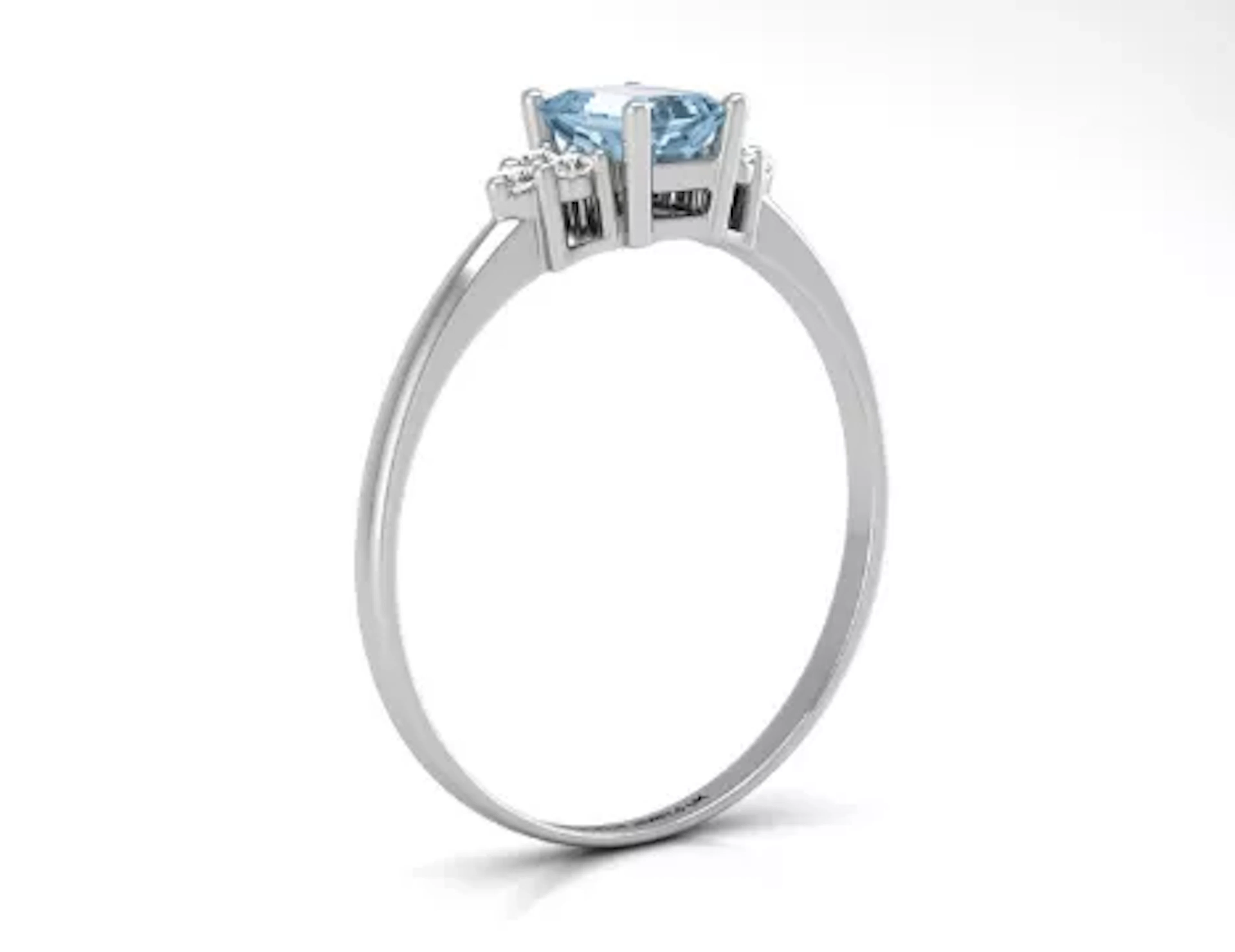 9ct White Gold Fancy Cluster Diamond Blue Topaz Ring (BT0.61) 0.06 Carats