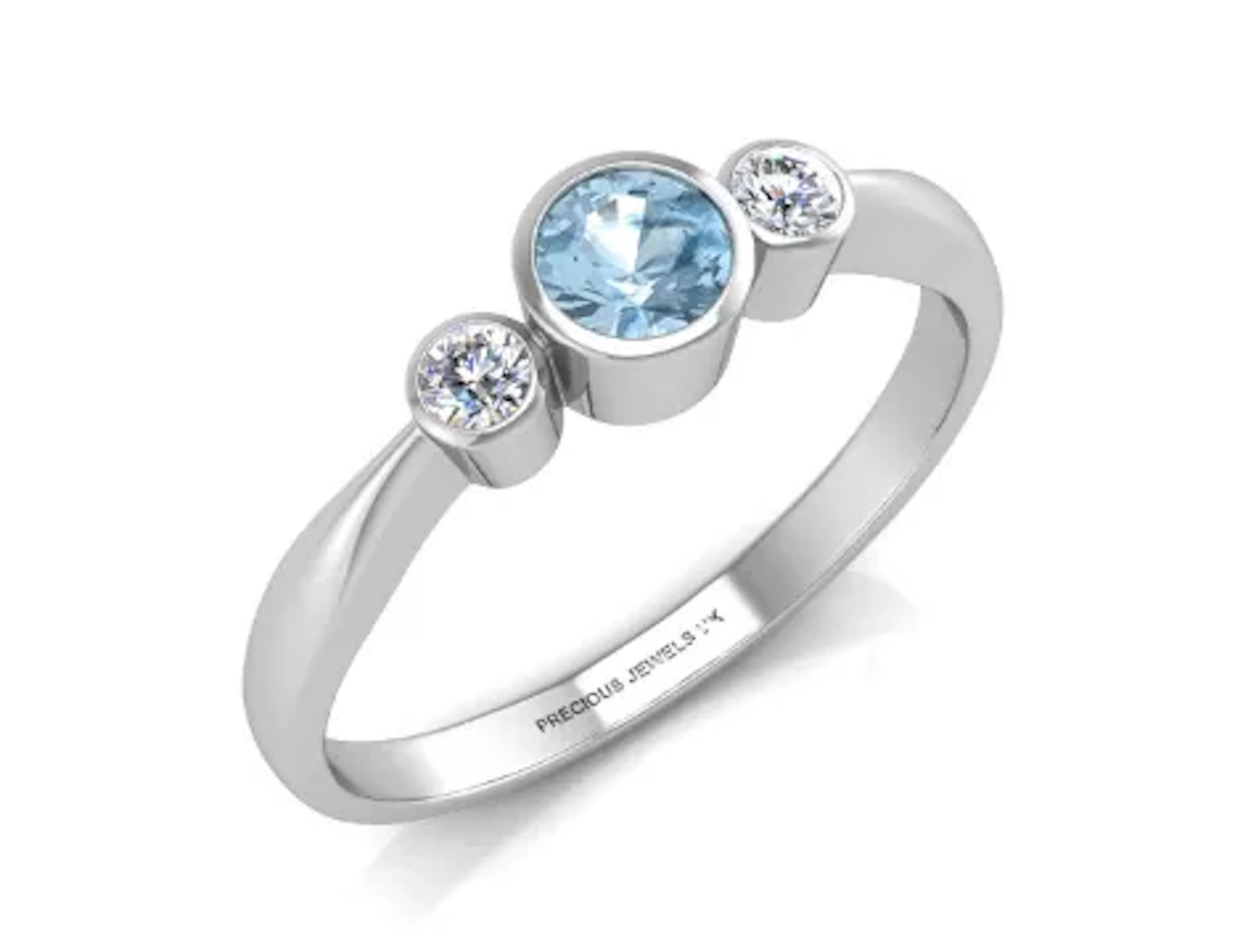 9ct White Gold Three Stone Diamond And Blue Topaz Ring (BT0.35) 0.10 Carats