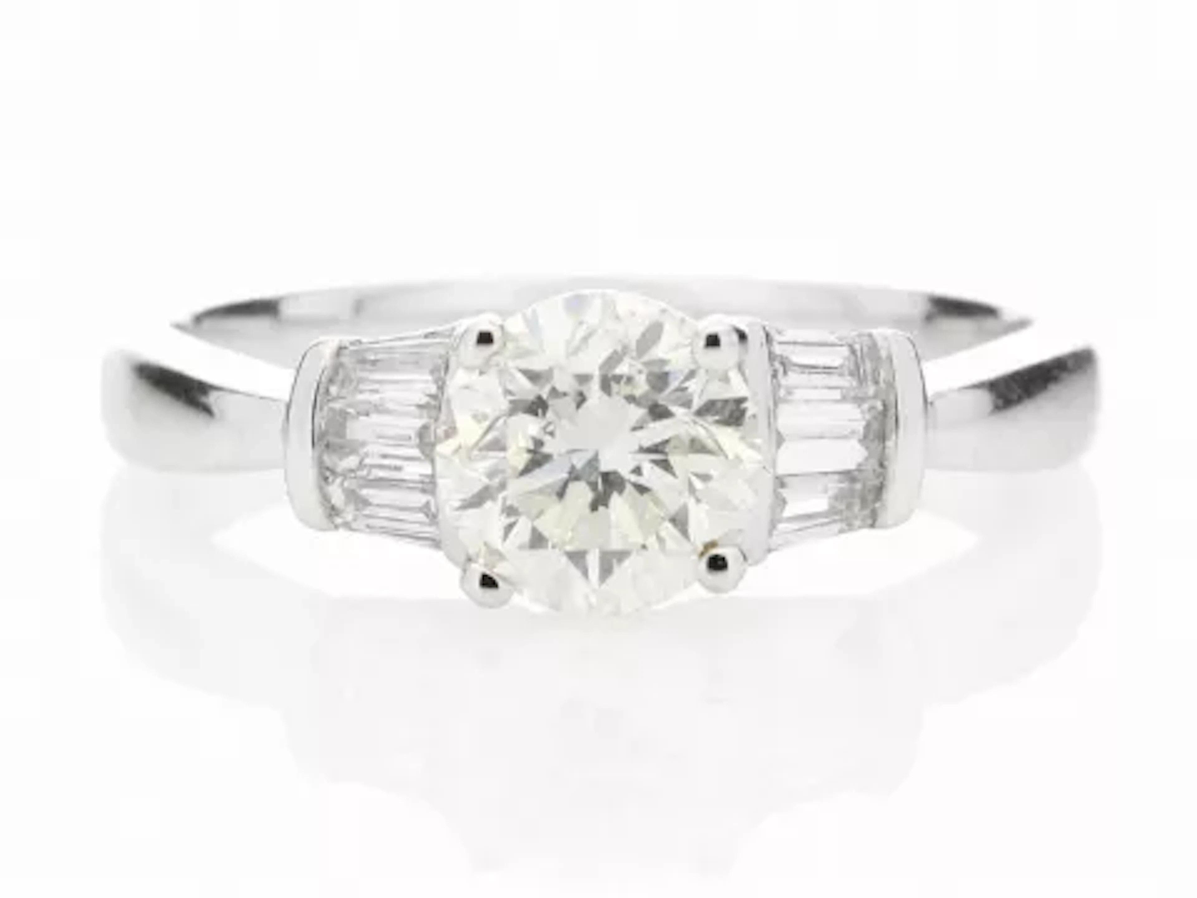 18ctWhite Gold Single Stone With Baguette Set Shoulders Diamond Ring