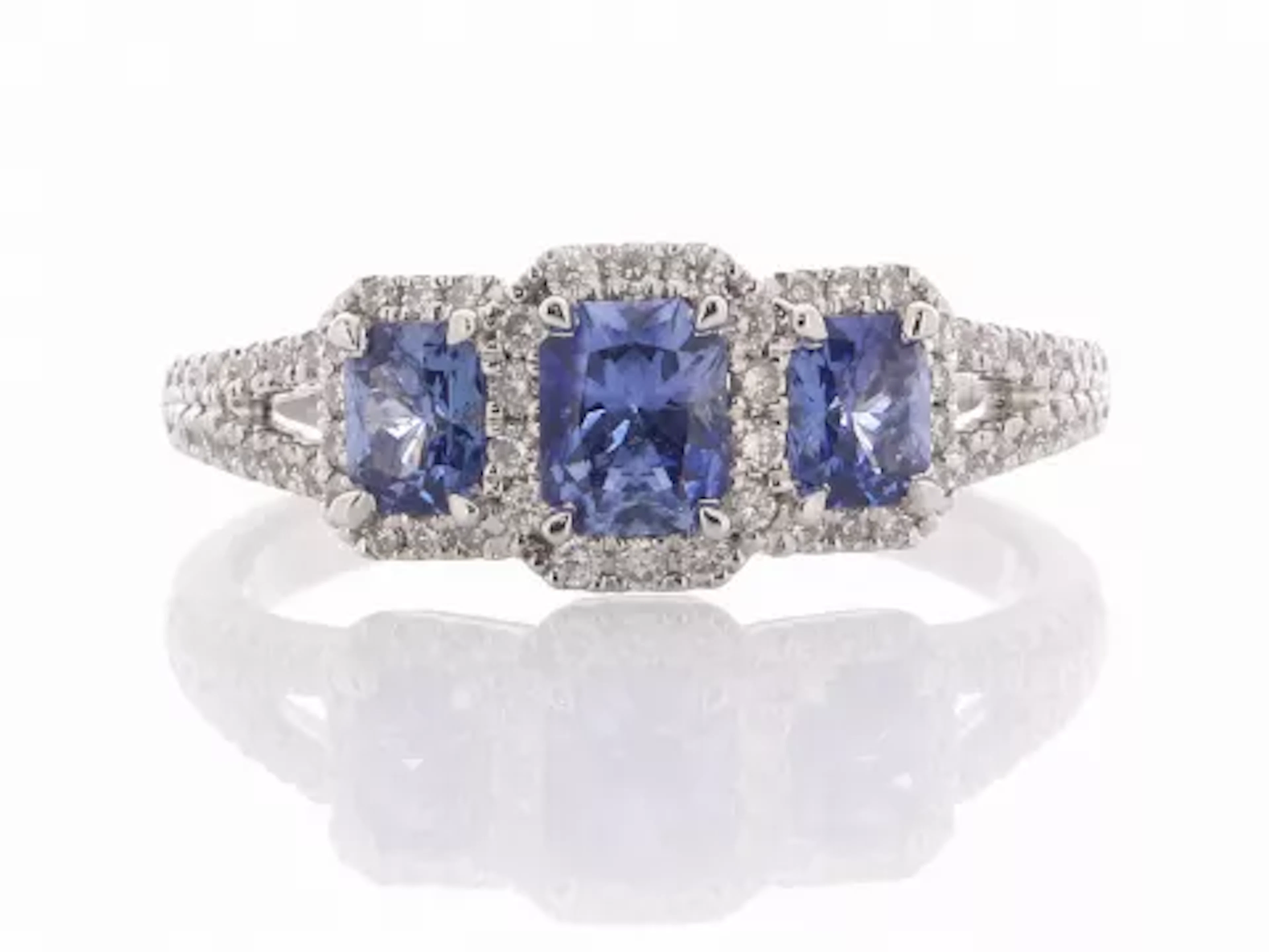 18ct White Gold Three Stone Emerald Cut Sapphire And Diamond Ring