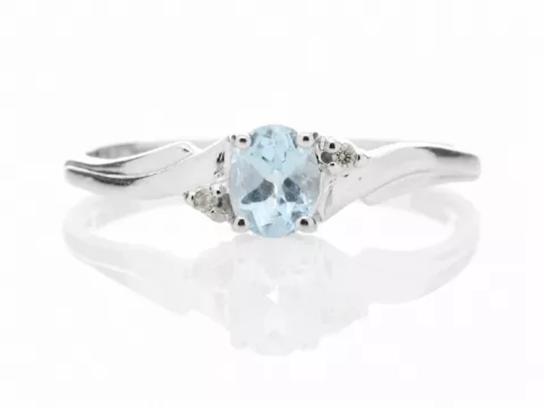 9ct White Gold Diamond and Blue Topaz Ring (BT0.50) 0.01 Carats