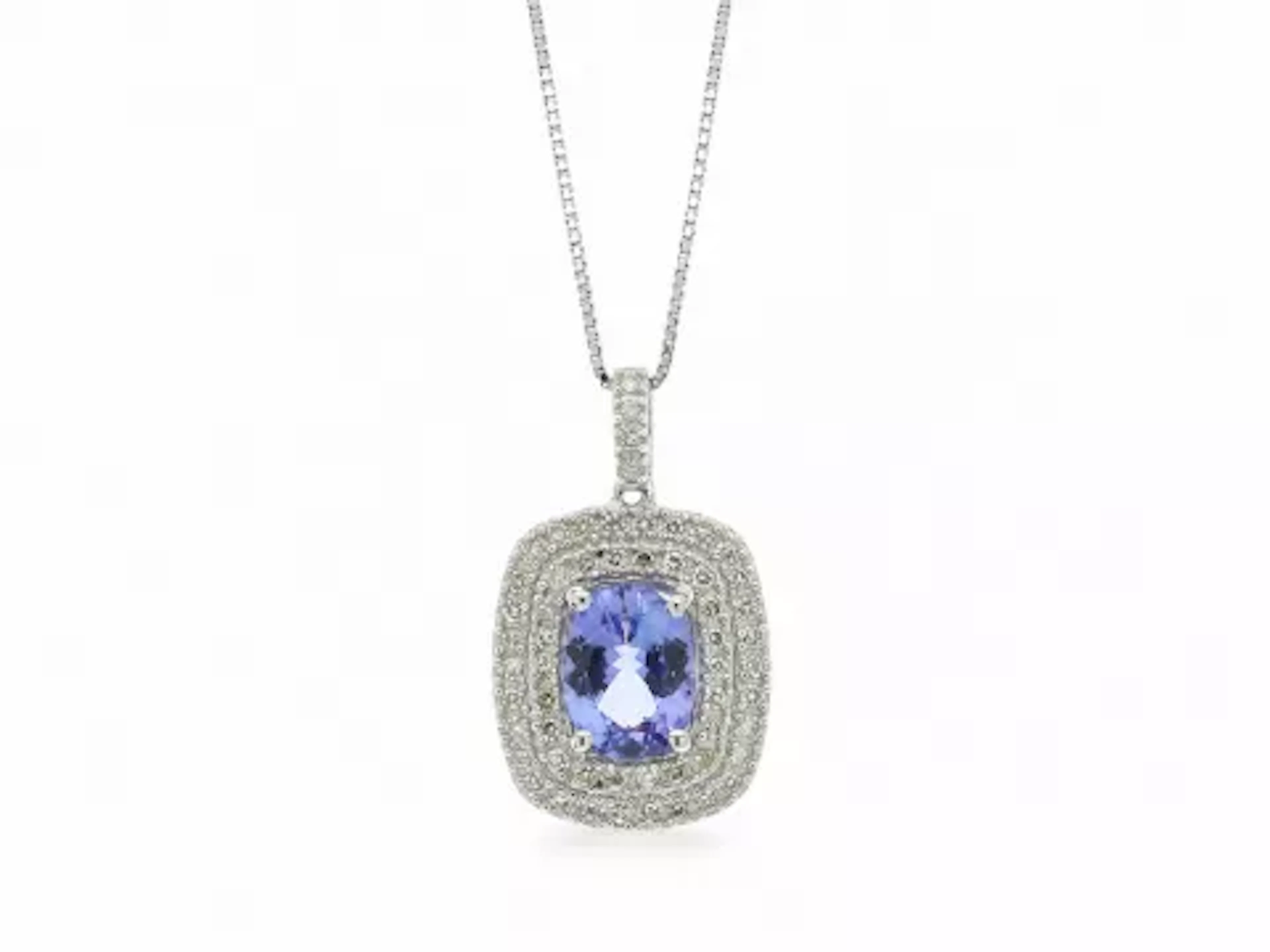 9ct White Gold Oval Tanzanite And Diamond Cluster Pendant 0.28 Carats
