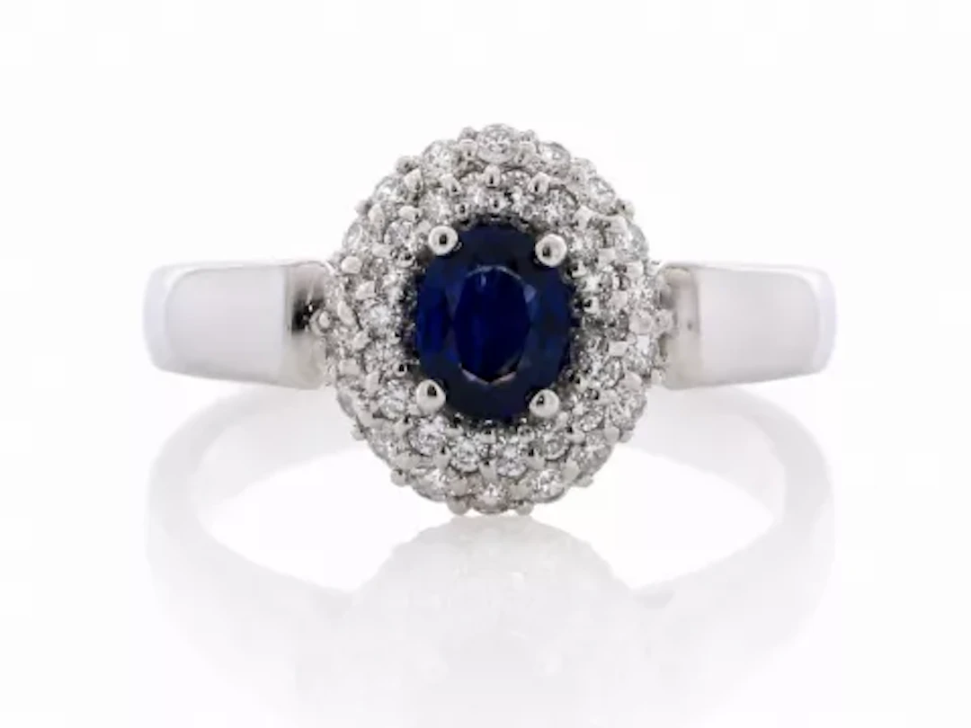 Platinum Oval Cluster Claw Set Diamond And Sapphire Ring (S0.43) 0.34 Carats