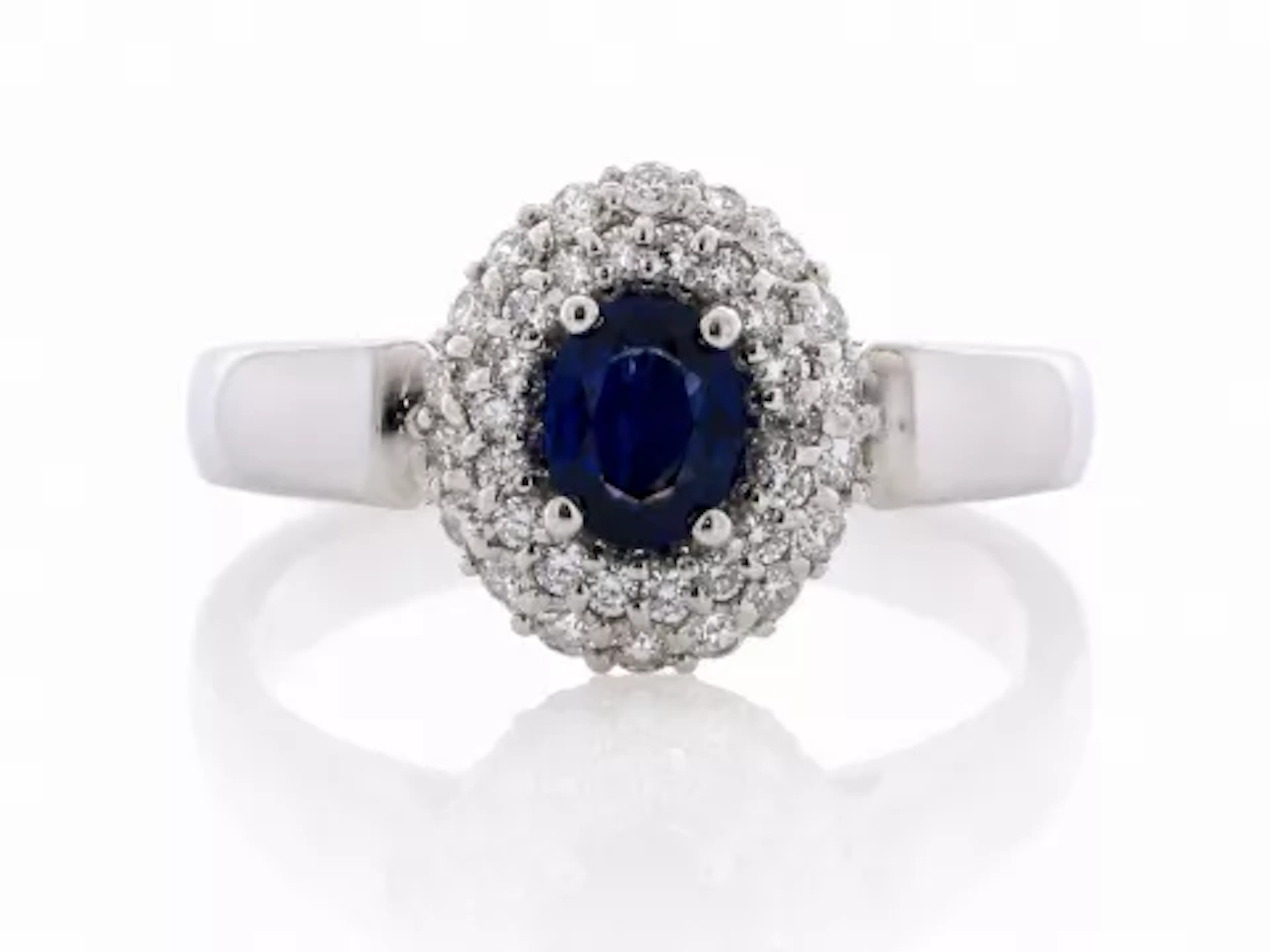 Platinum Oval Cluster Claw Set Diamond And Sapphire Ring (S0.43) 0.34 Carats