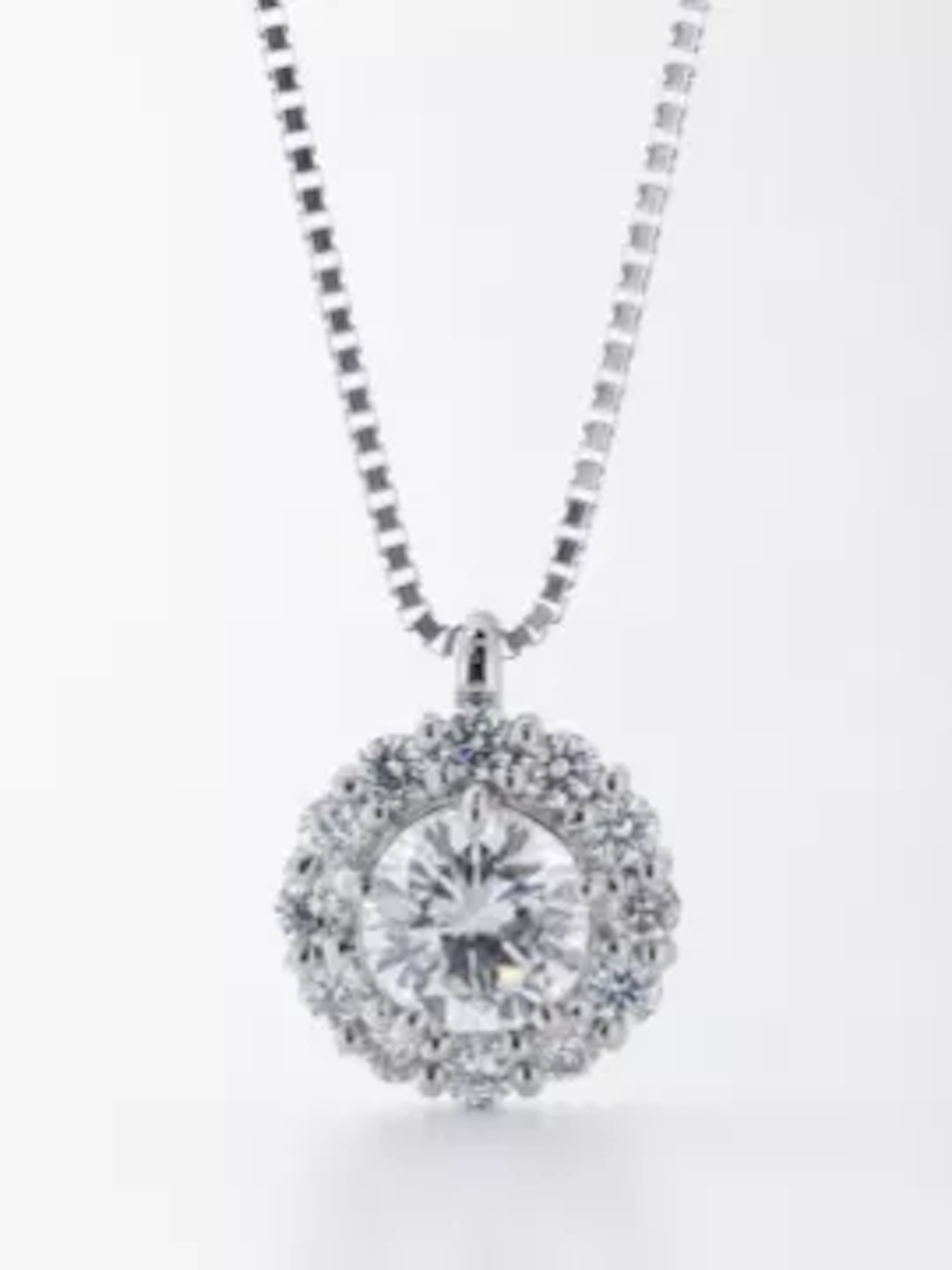 Platinum Round Cluster Claw Set Diamond Pendant 0.90 Carats