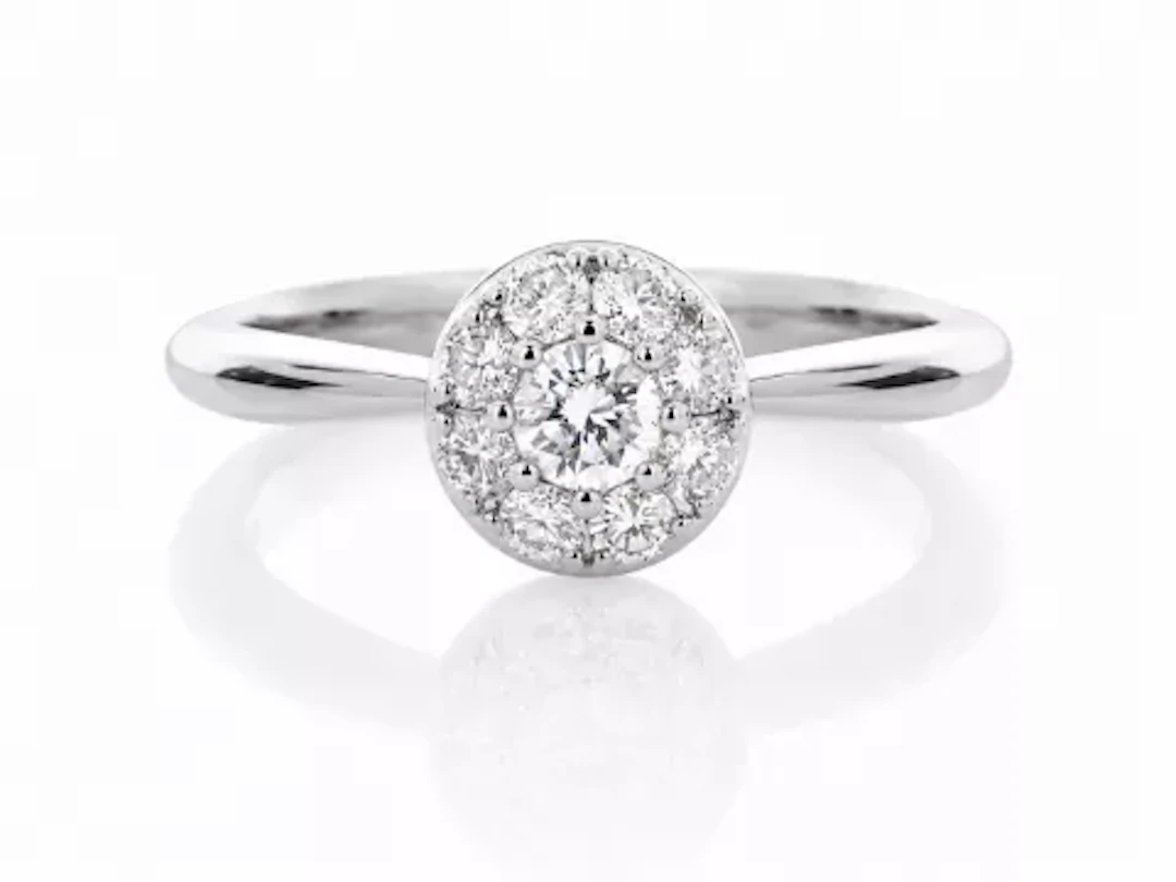 Platinum Round Cluster Claw Set Diamond Ring 0.50 Carats