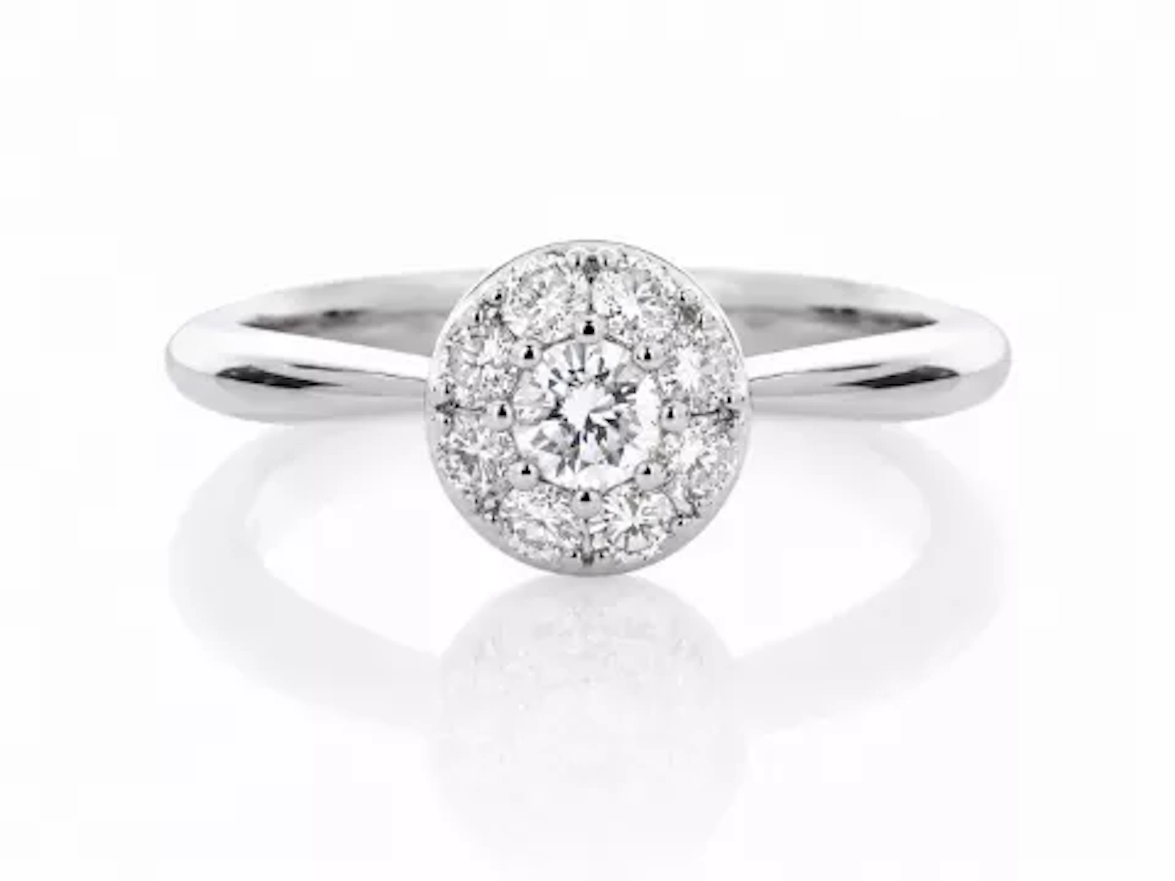 Platinum Round Cluster Claw Set Diamond Ring 0.50 Carats