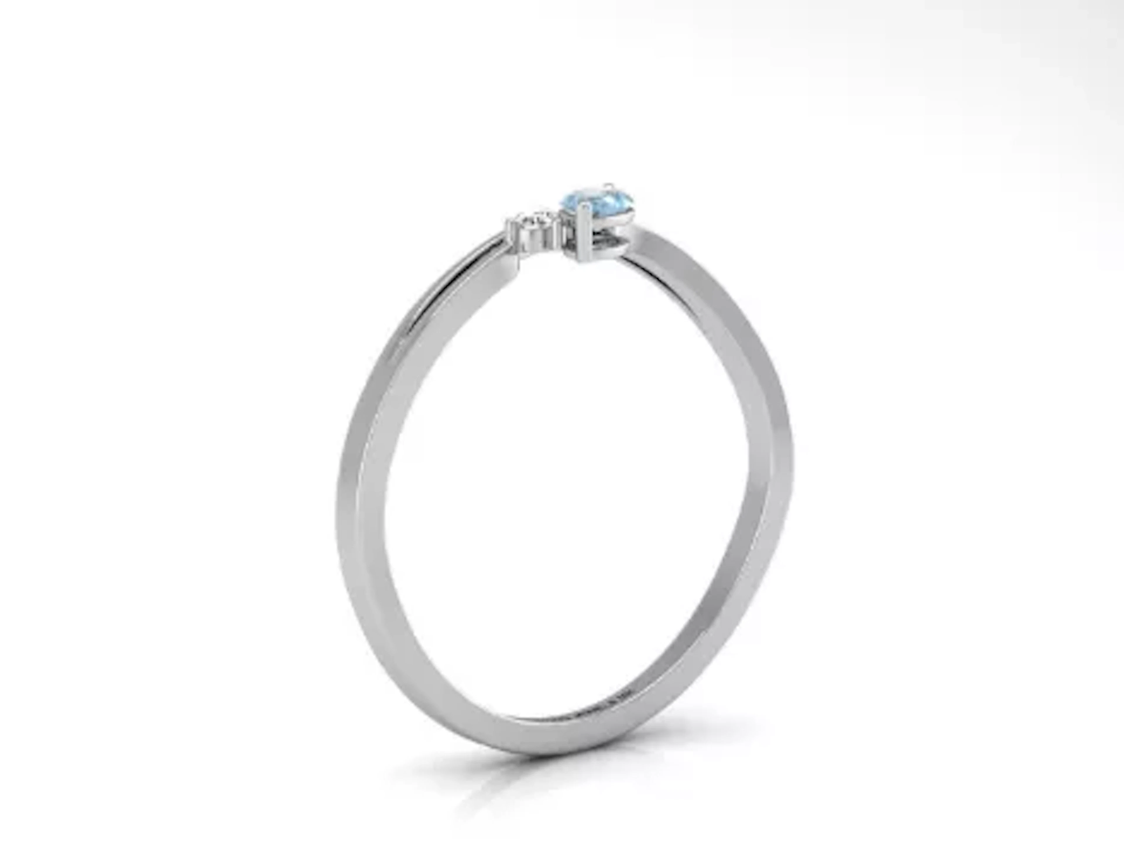 9ct White Gold Fancy Cluster Diamond And Blue Topaz Ring (BT0.22) 0.03 Carats