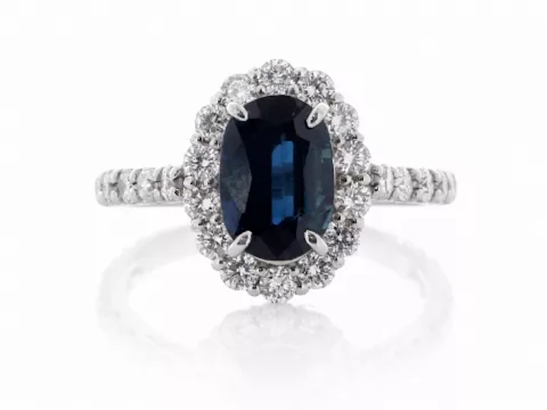 Platinum Oval Cluster Claw Set Diamond And Sapphire Ring (S2.45) 0.94 Carats