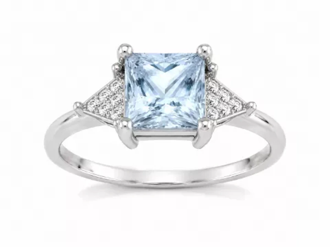 9ct White Gold Diamond And Blue Topaz Ring