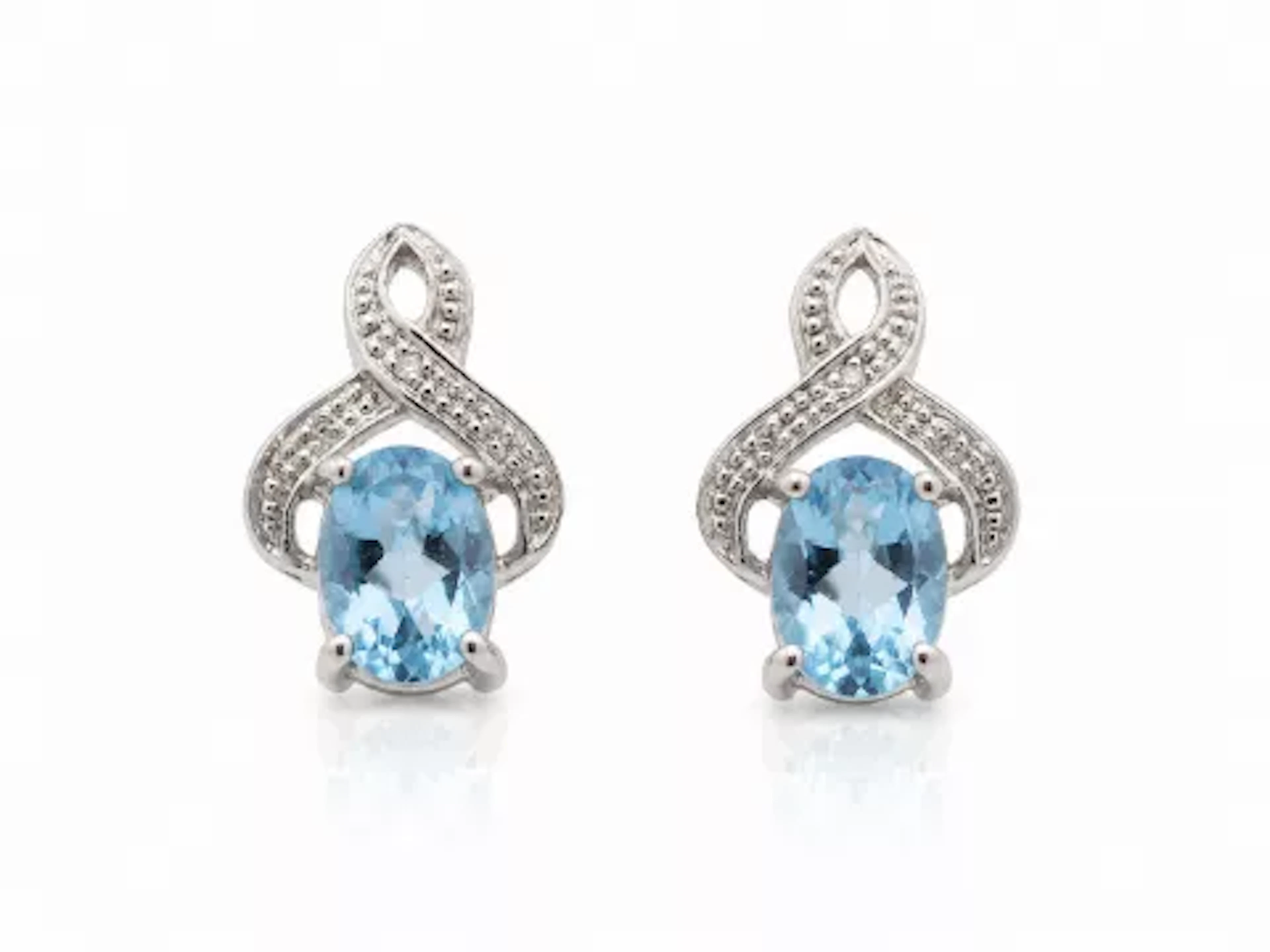 9ct White Gold Diamond And Blue Topaz Earrings