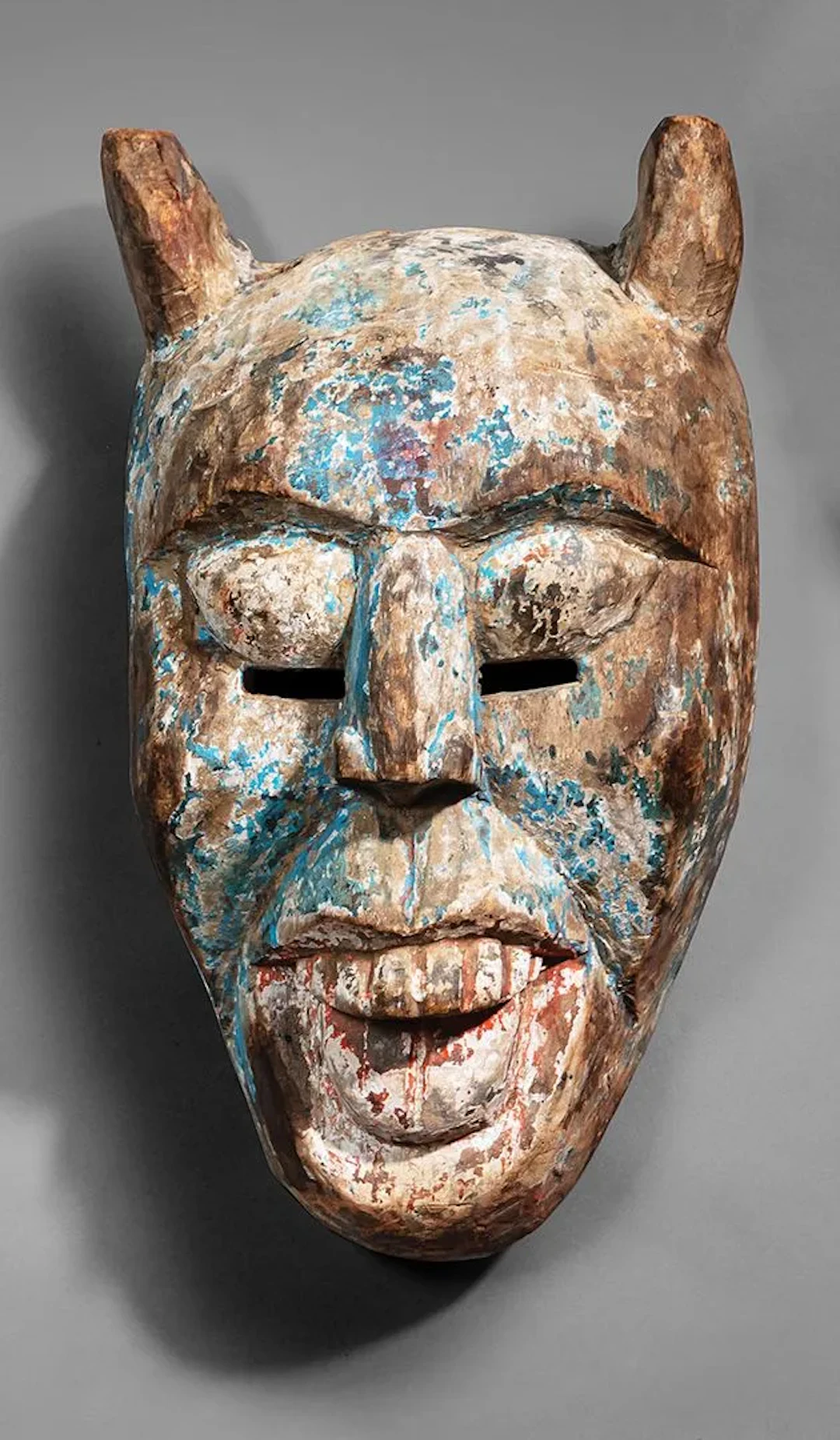 INDIA: A carved and polychrome wooden mask of a horned demon - Lot 5