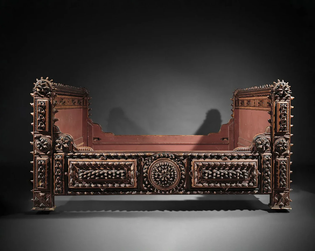 A set of richly carved wooden bedroom furniture featuring ro - Lot 60