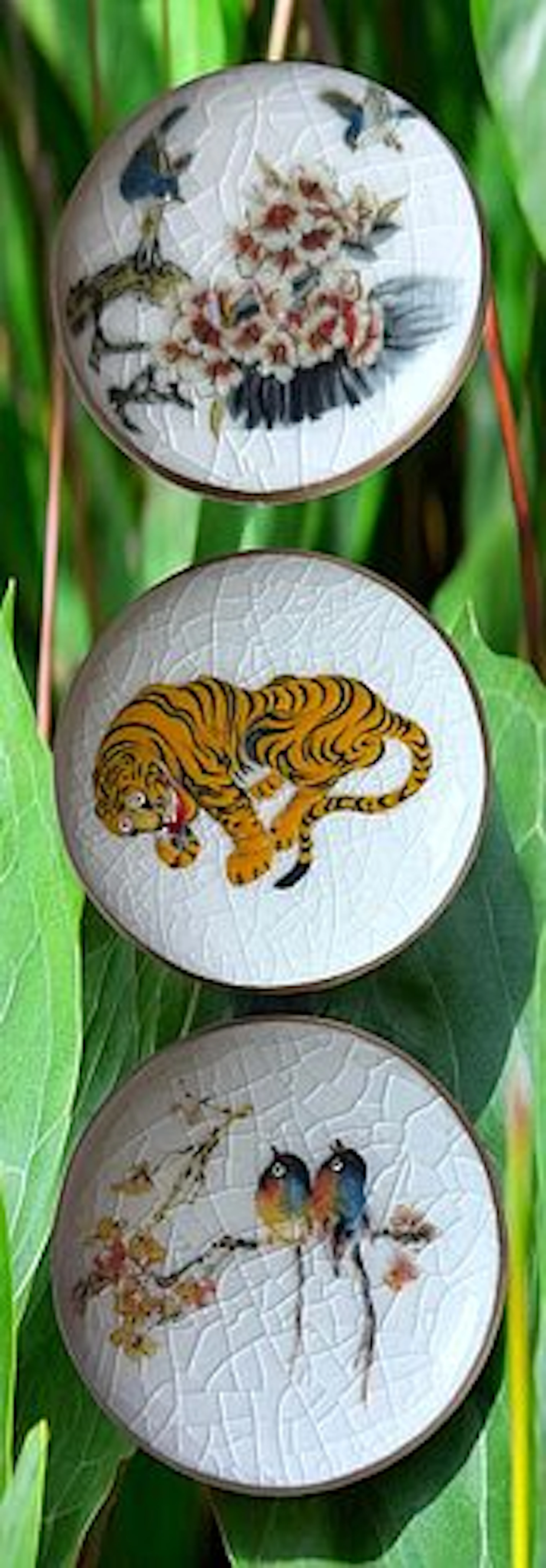 A SMALL CARD OF DIVISION THREE SATSUMA BUTTONS