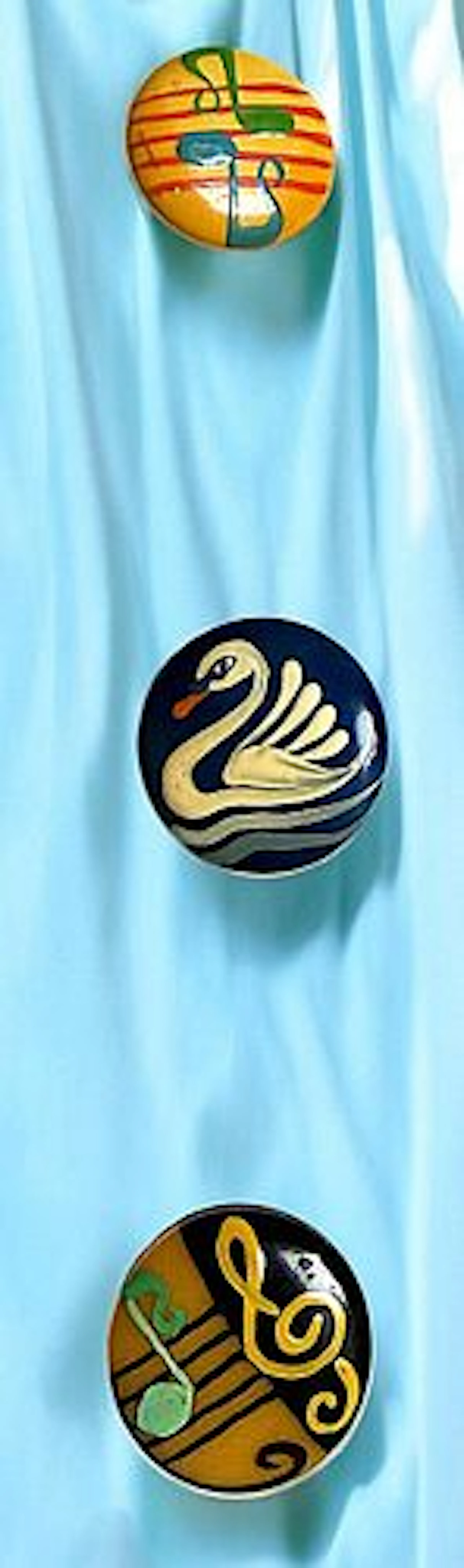 A SMALL CARD OF DIVISION 3 HAND PAINTED CASEIN BUTTONS