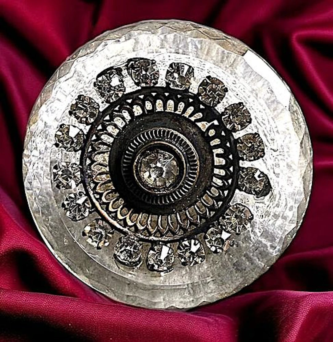 A DIVISION ONE CRYSTAL AND PASTE JEWEL BUTTON