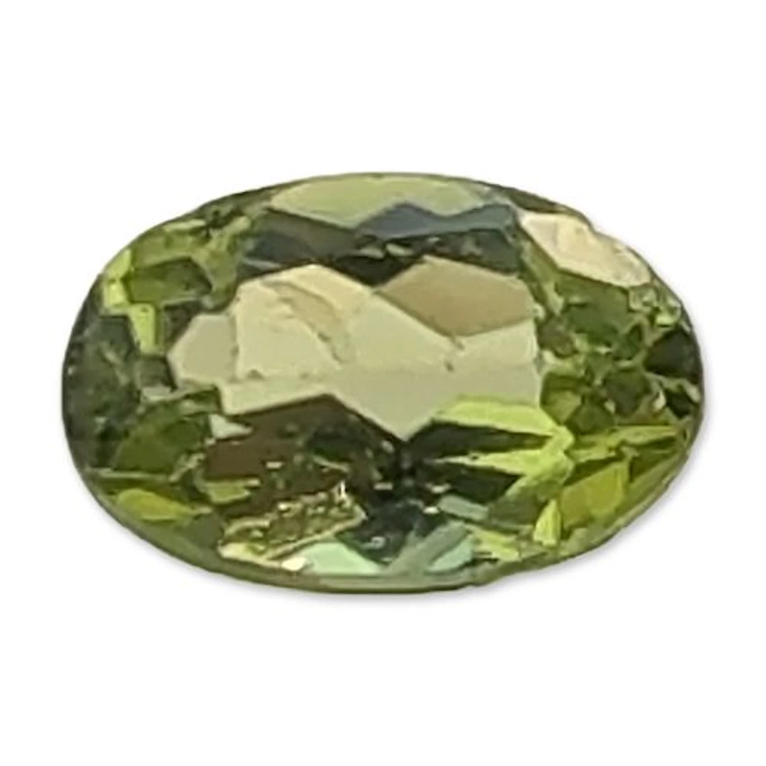 Yellowish Green Oval Cut Faceted Gemstone