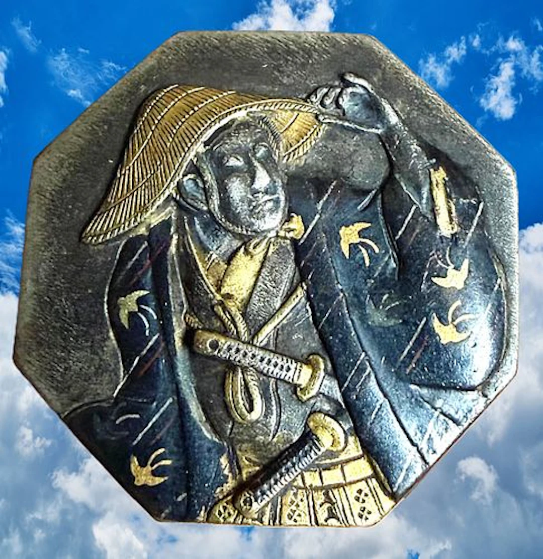 A DIVISION ONE JAPANESE METAL WORKS PICTORIAL BUTTON