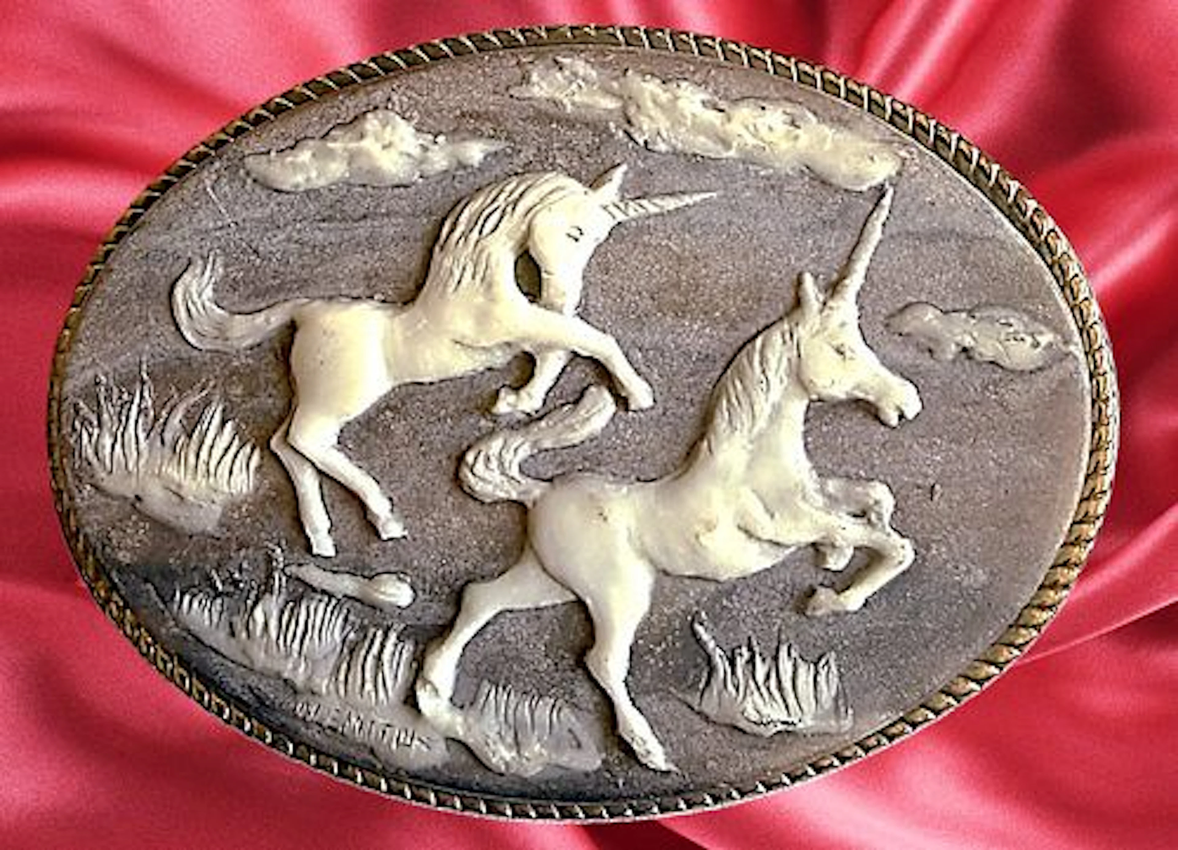 A COOL DIVISION THREE PICTORIAL BUCKLE