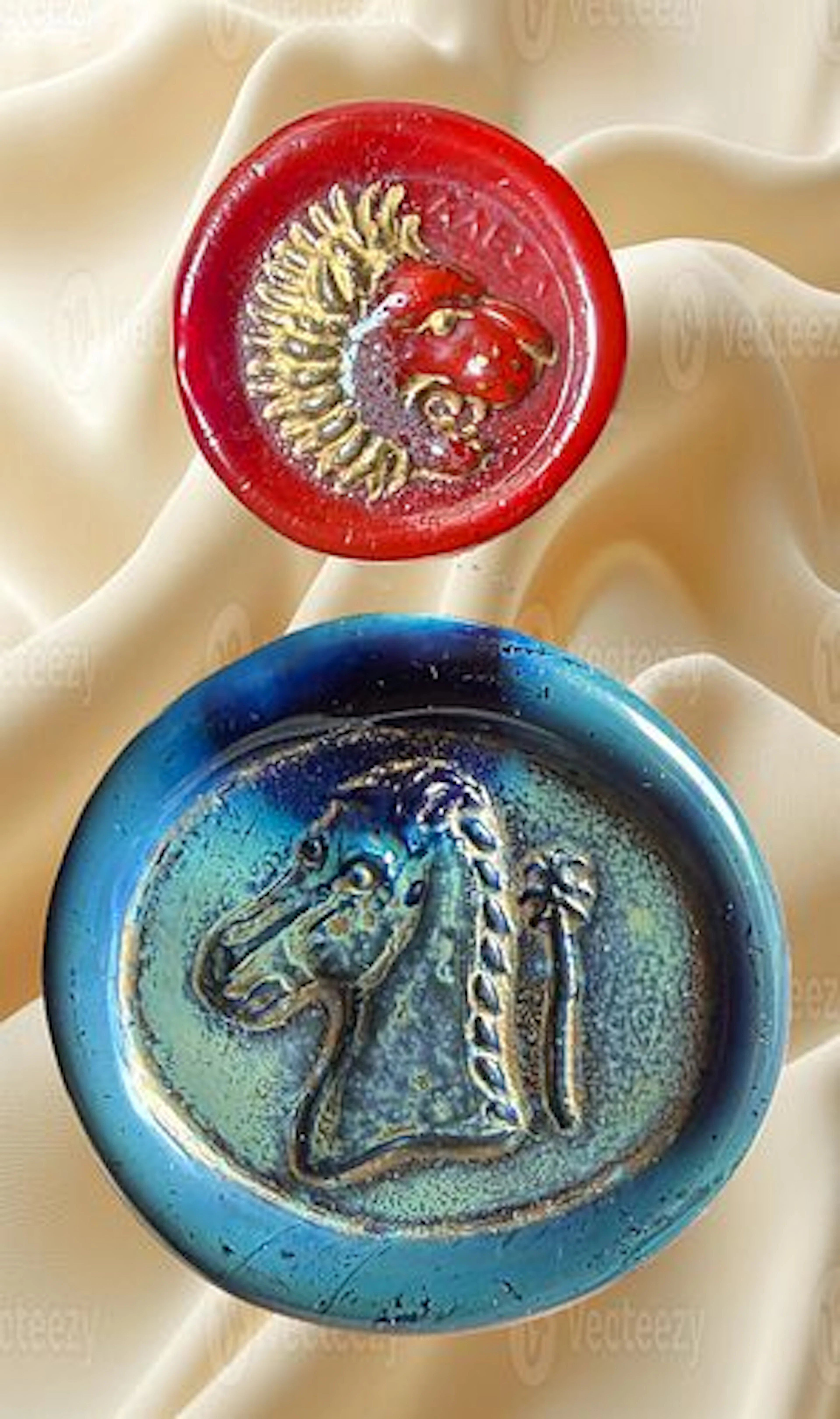 A SMALL CARD OF DIVISION THREE ENGLISH GLASS BUTTONS