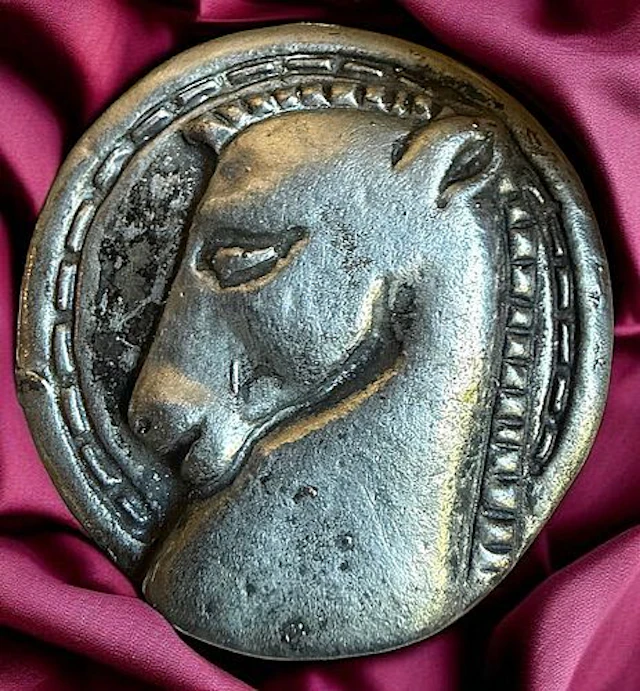 A DIVISION THREE PICTORIAL HORSE BUTTON
