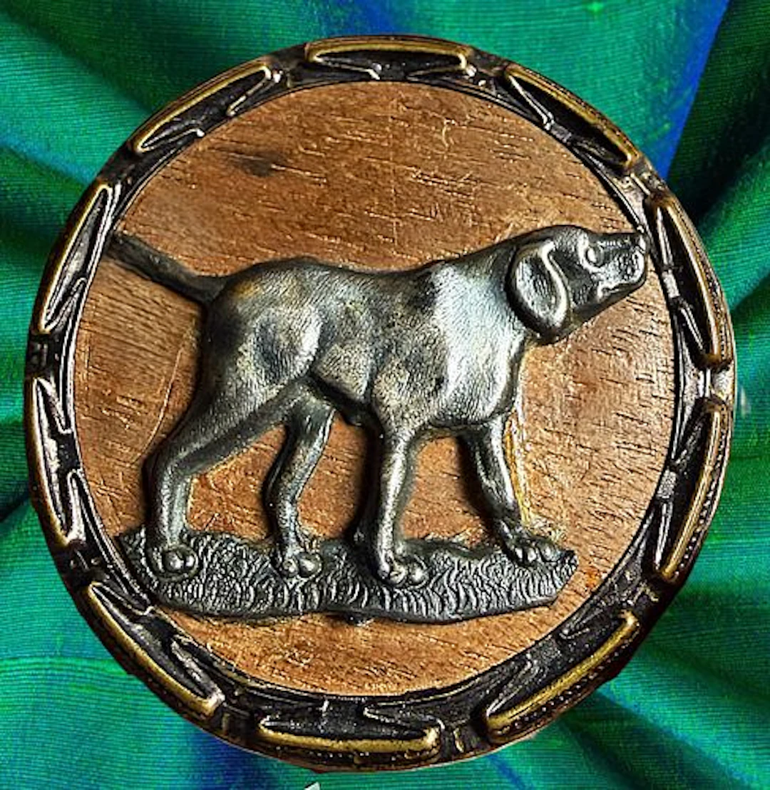 A SCARCE DIVISION ONE WOOD ANIMAL BUTTON