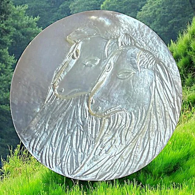 A DIVISION THREE BETHLEHEM PEARL ANIMAL BUTTON