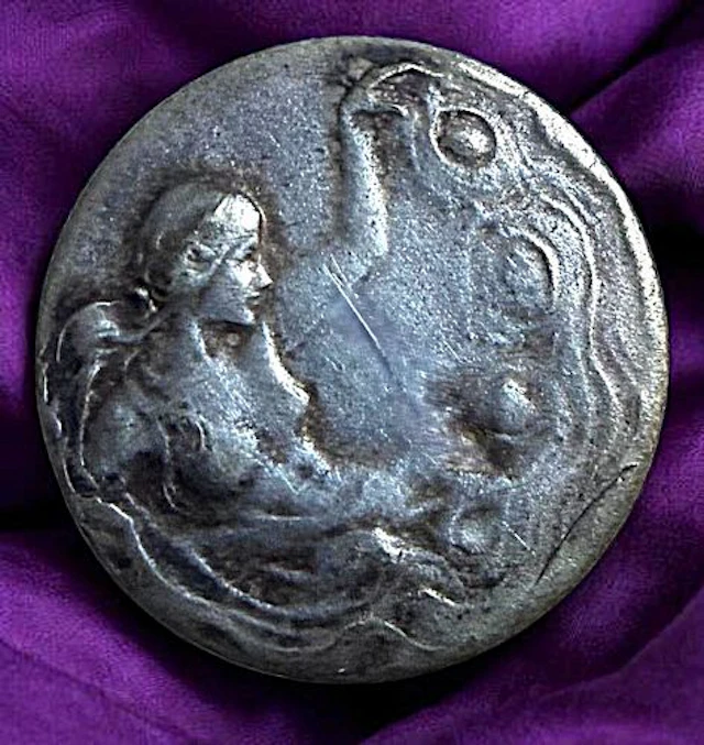 A DIVISION ONE THIRD AVENUE SILVER BUTTON