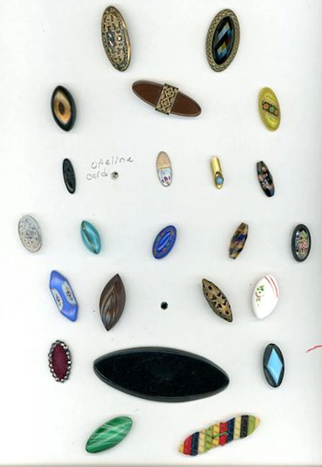 A CARD OF DIVISION ONE AND THREE OVAL/SPINDLE BUTTONS