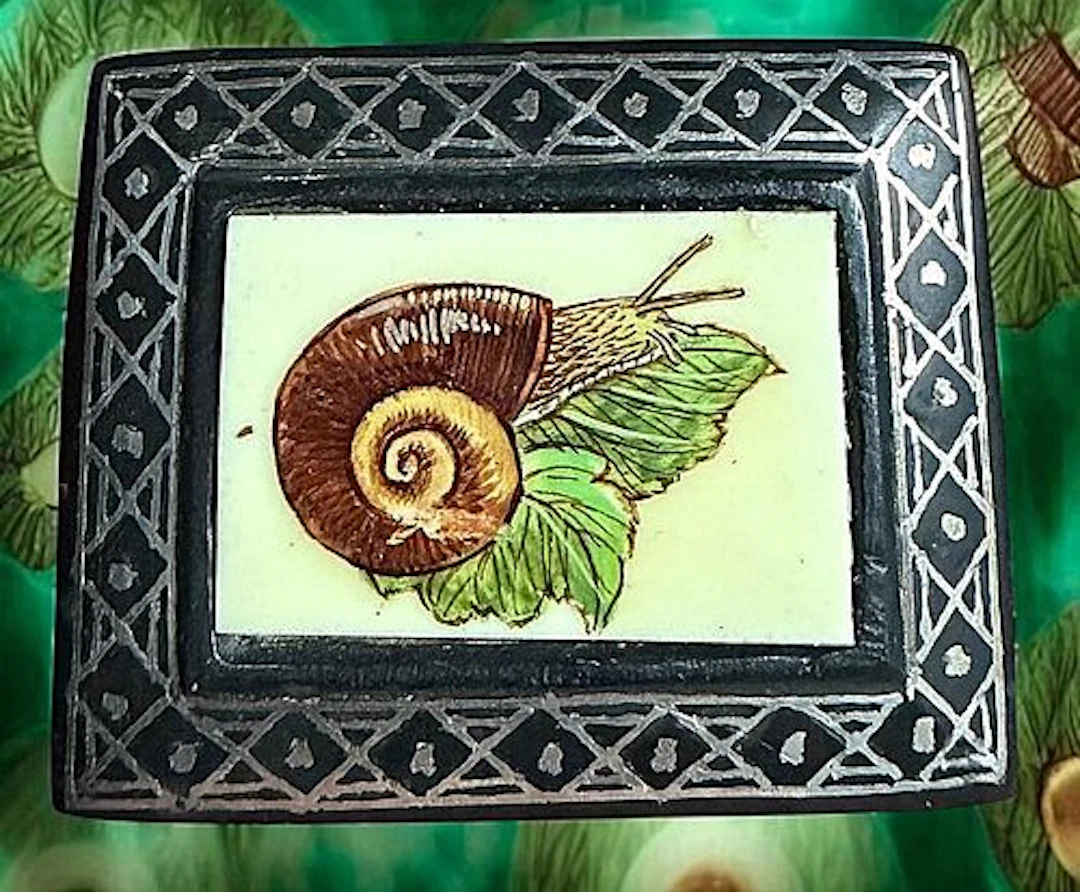 A DIVISION THREE PICTORIAL ANIMAL BUTTON