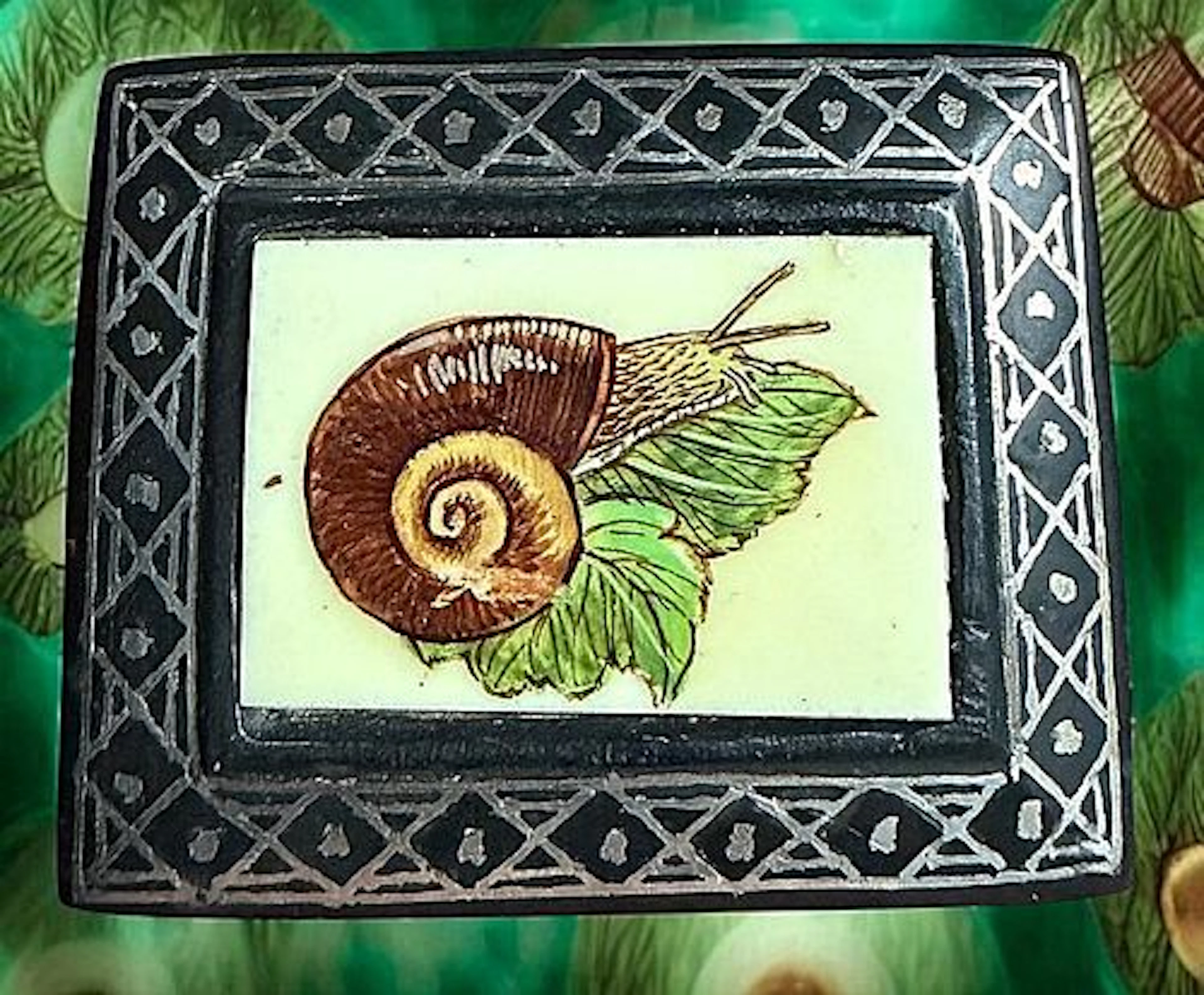 A DIVISION THREE PICTORIAL ANIMAL BUTTON
