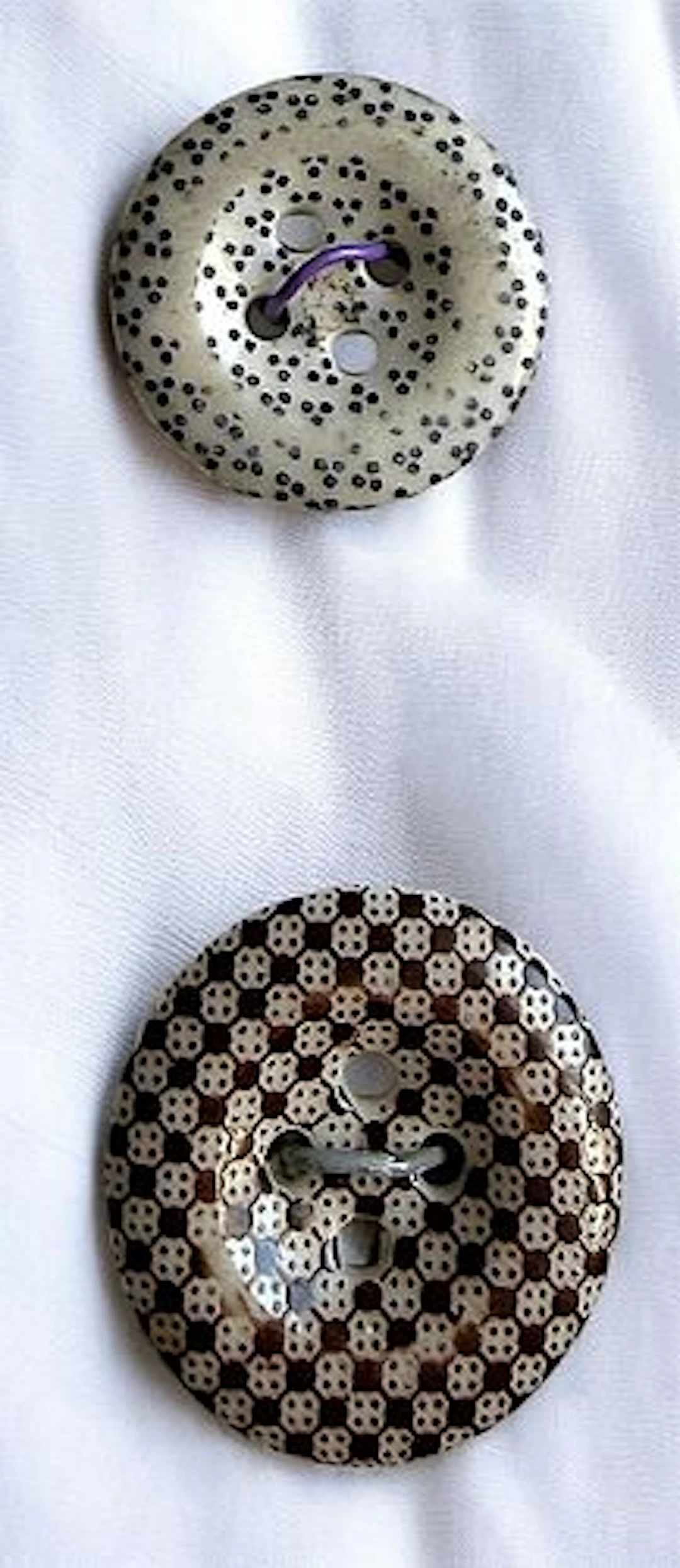 A SMALL CARD OF DIVISION ONE CALICO CHINA BUTTONS