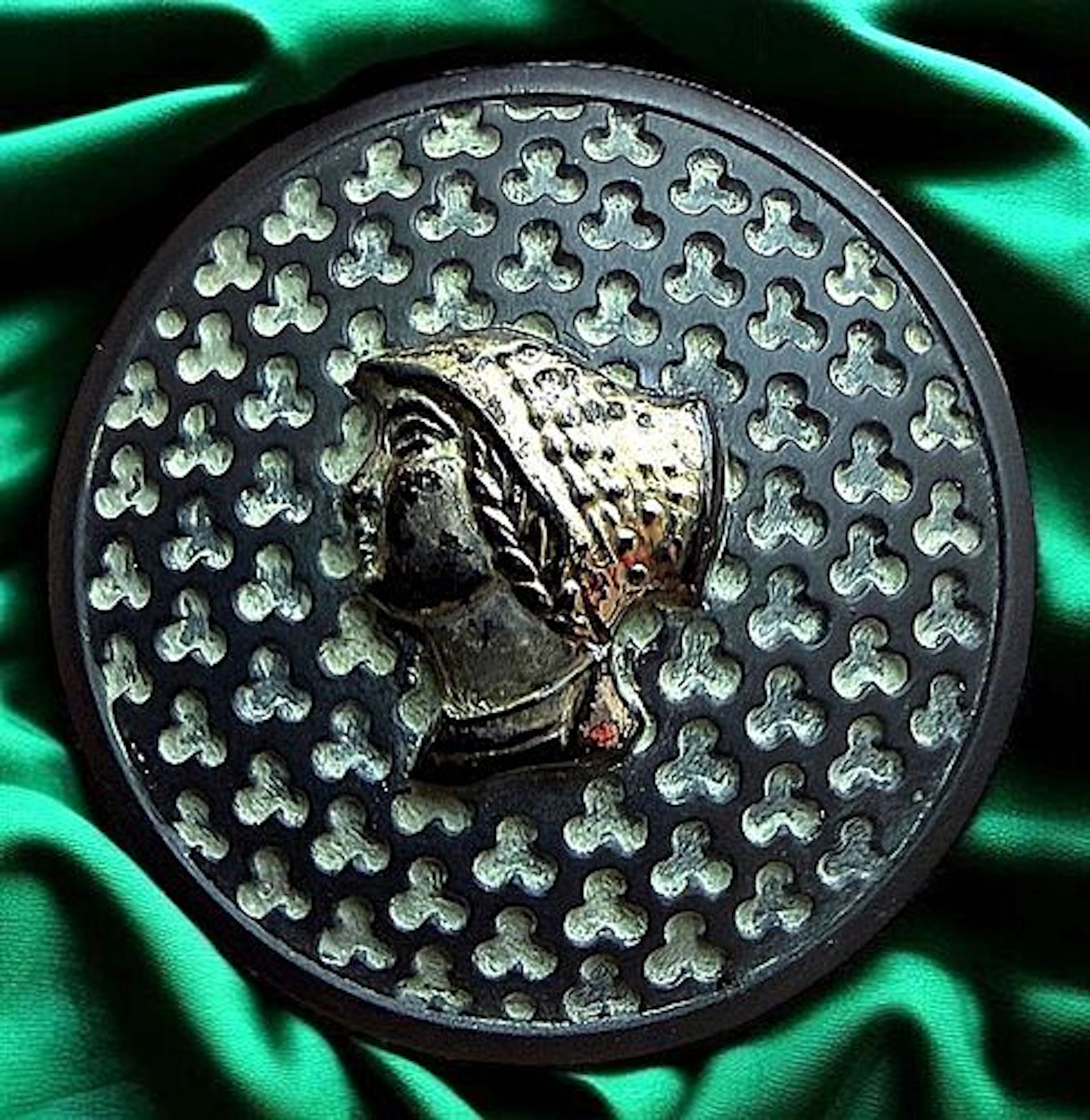 A DIVISION THREE PICTORIAL BLACK GLASS BUTTON