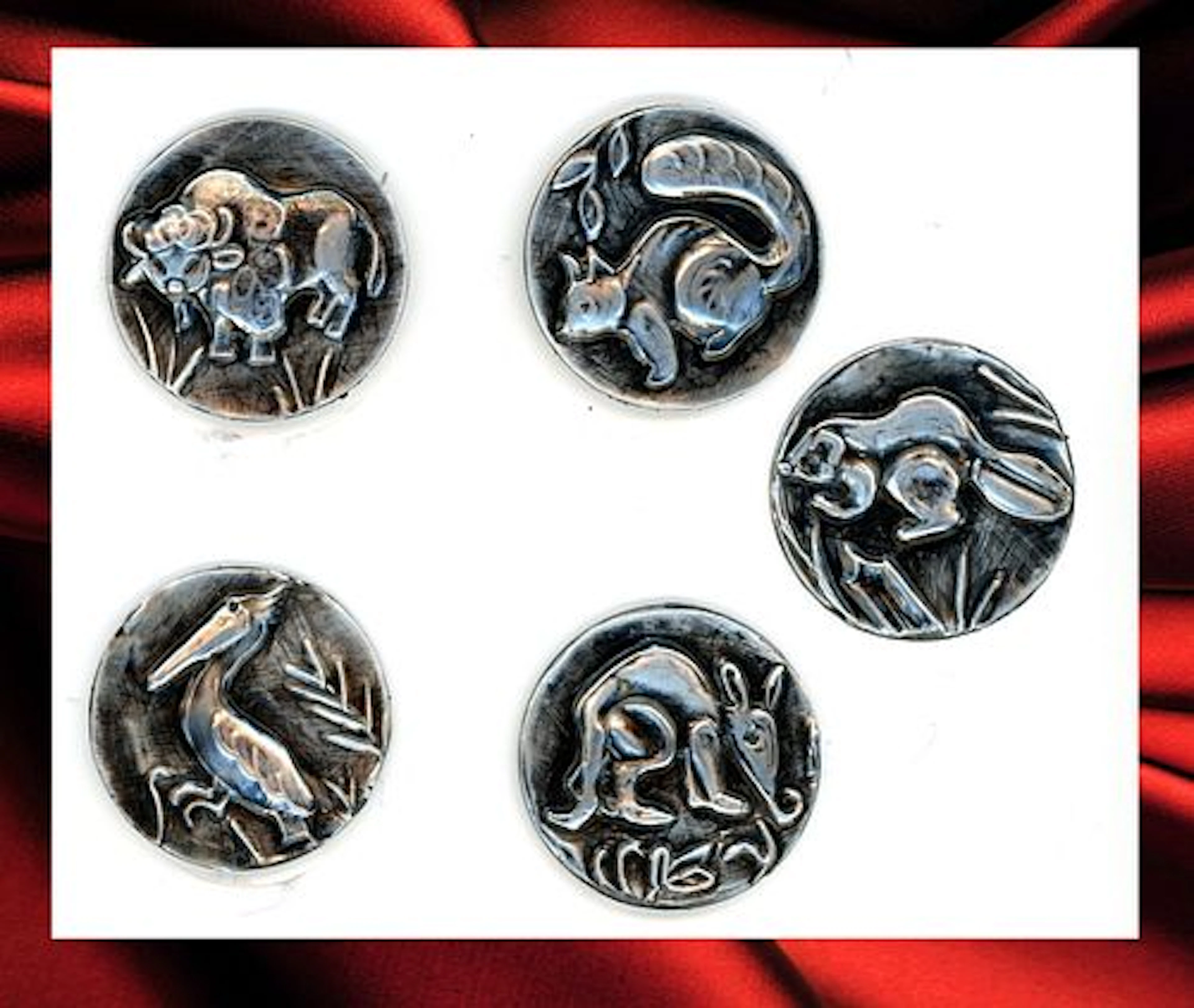 A SMALL CARD OF DIVISION THREE PICTORIAL BUTTONS