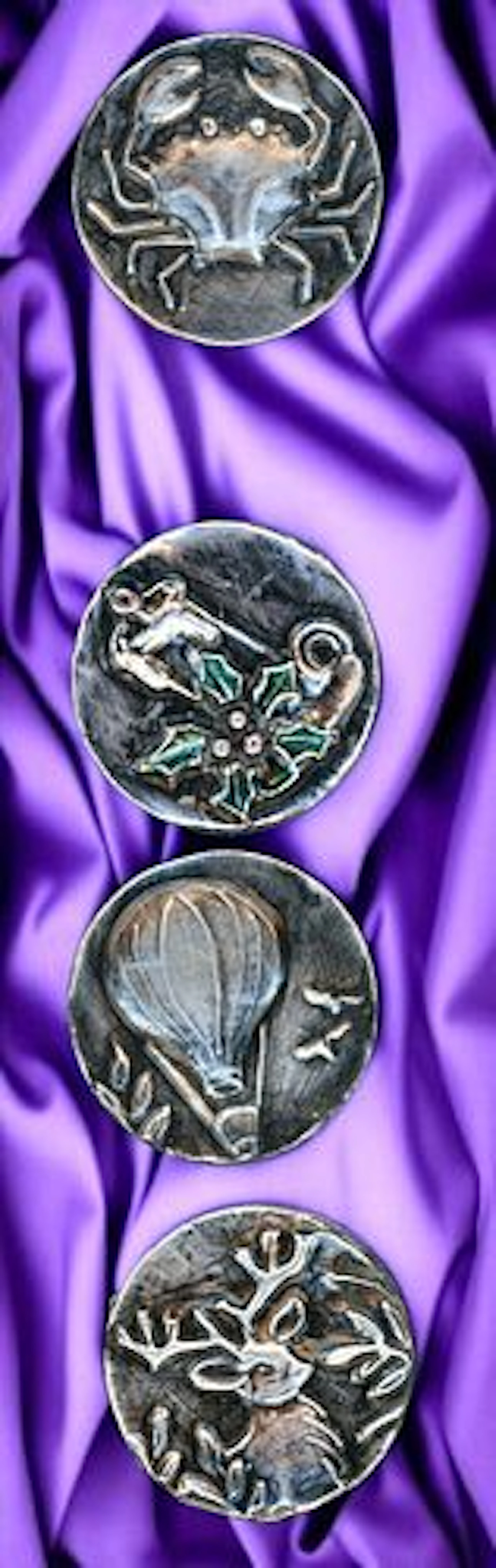 A SMALL CARD OF DIVISION THREE STUDIO ARTIST BUTTONS