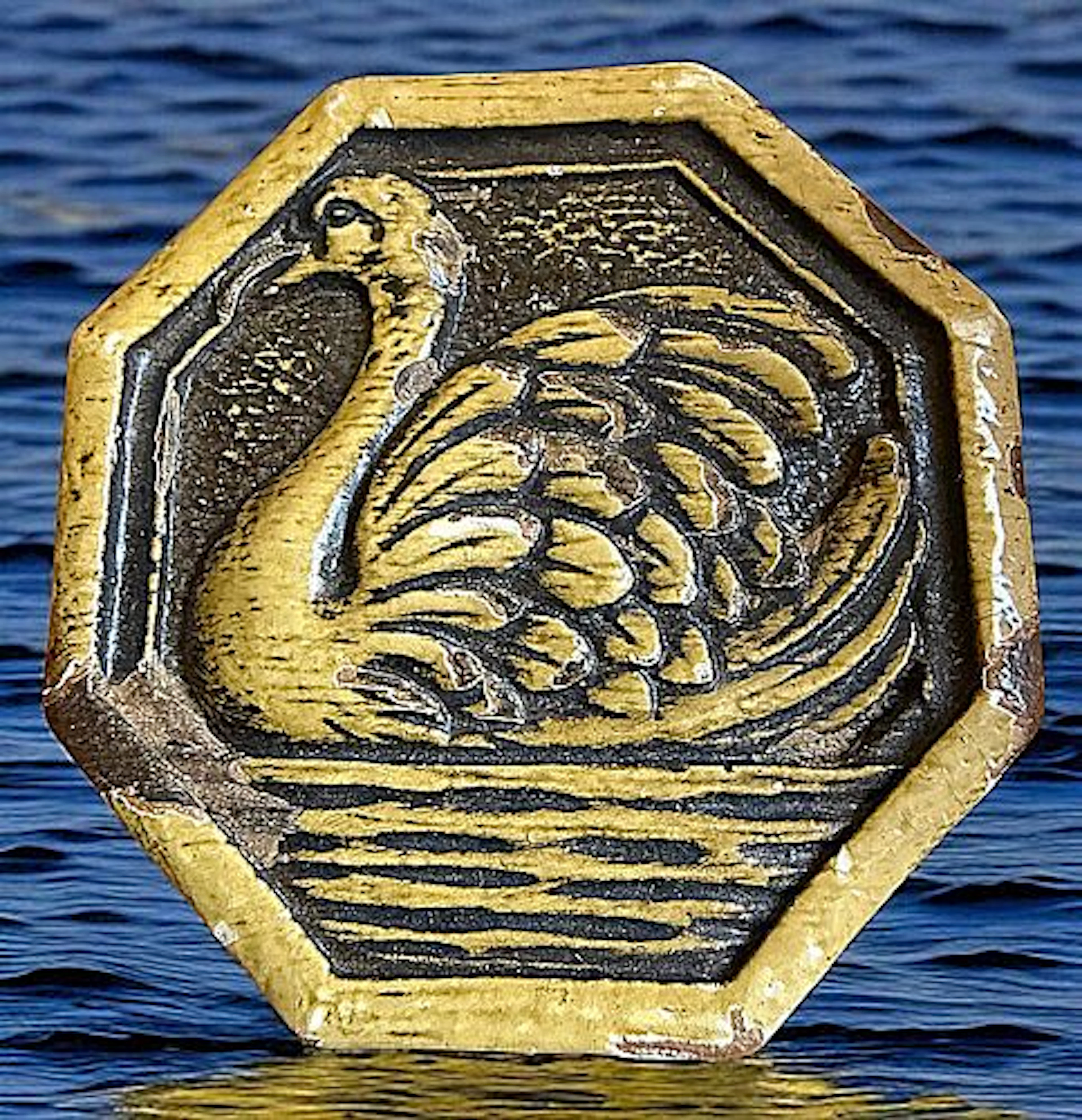 A SCARCE DIVISION THREE PICTORIAL WOOD BUTTON