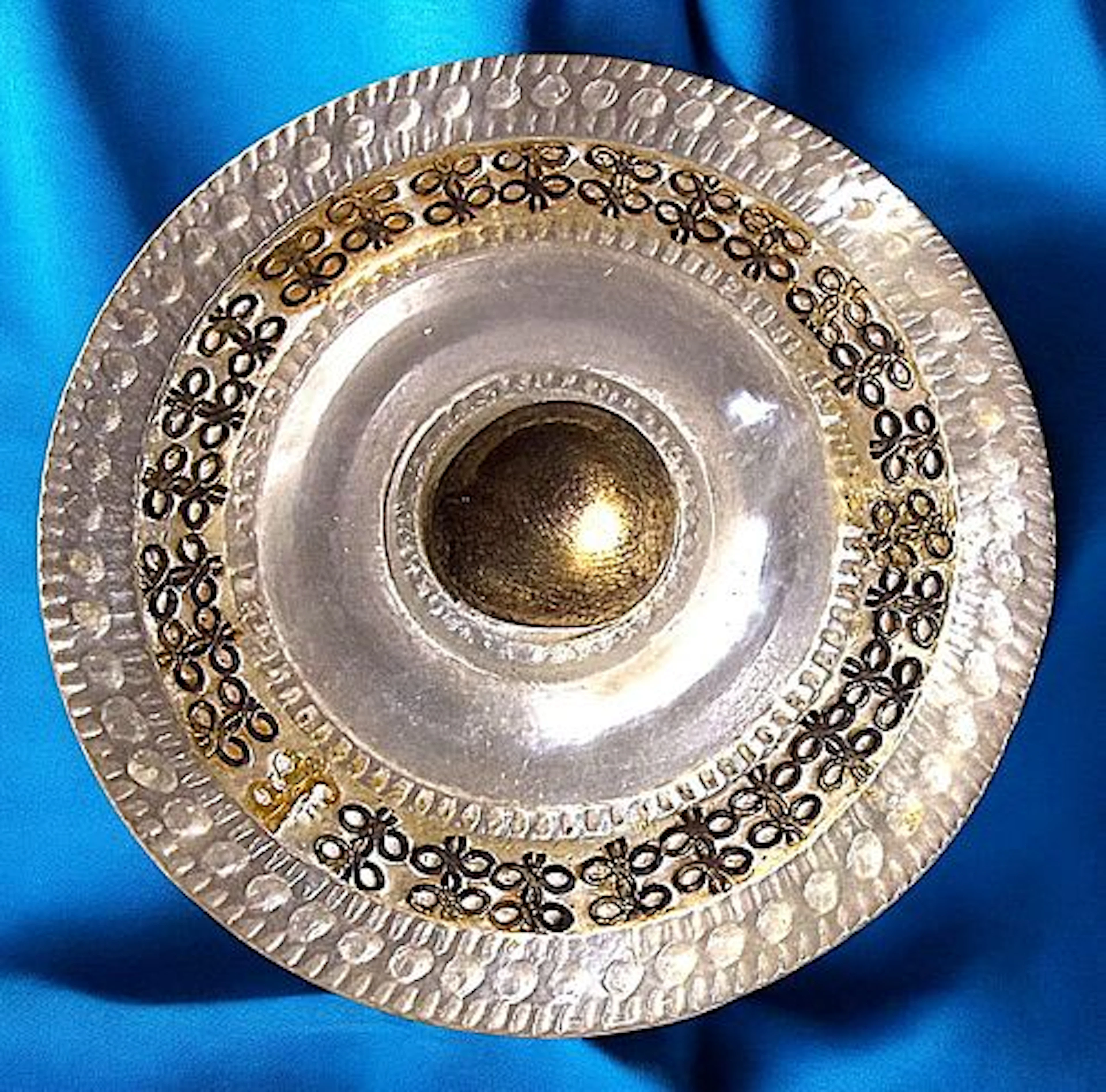 A DIVISION ONE METAL AND PINSHANKED PEARL BUTTON