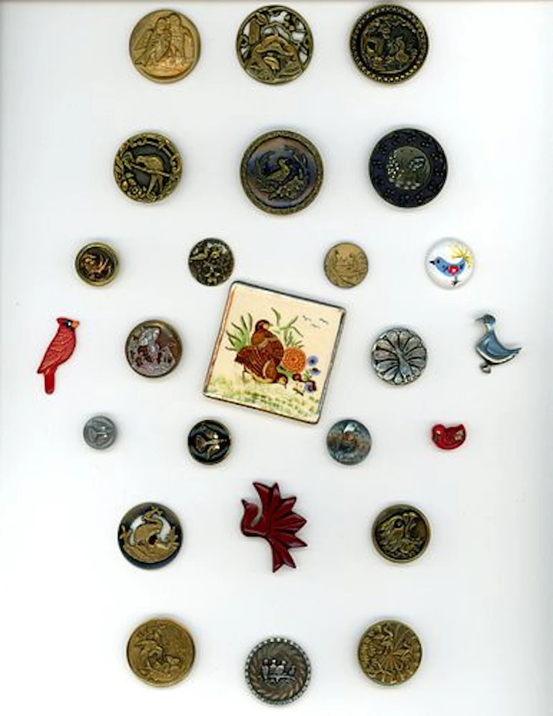 A CARD OF DIVISION ONE AND THREE BIRD BUTTONS
