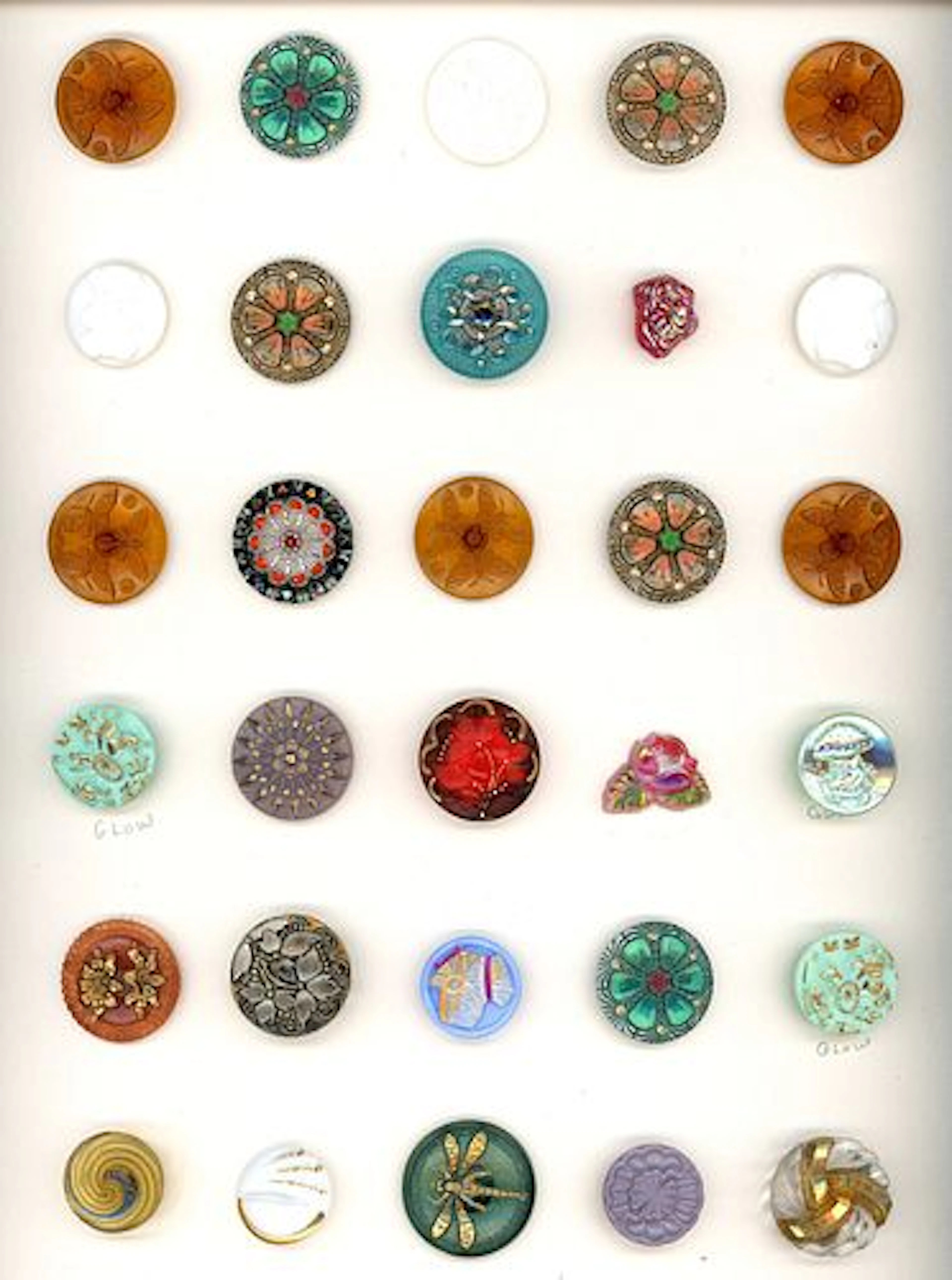 A CARD OF DIVISION THREE ASSORTED CZECH GLASS BUTTONS